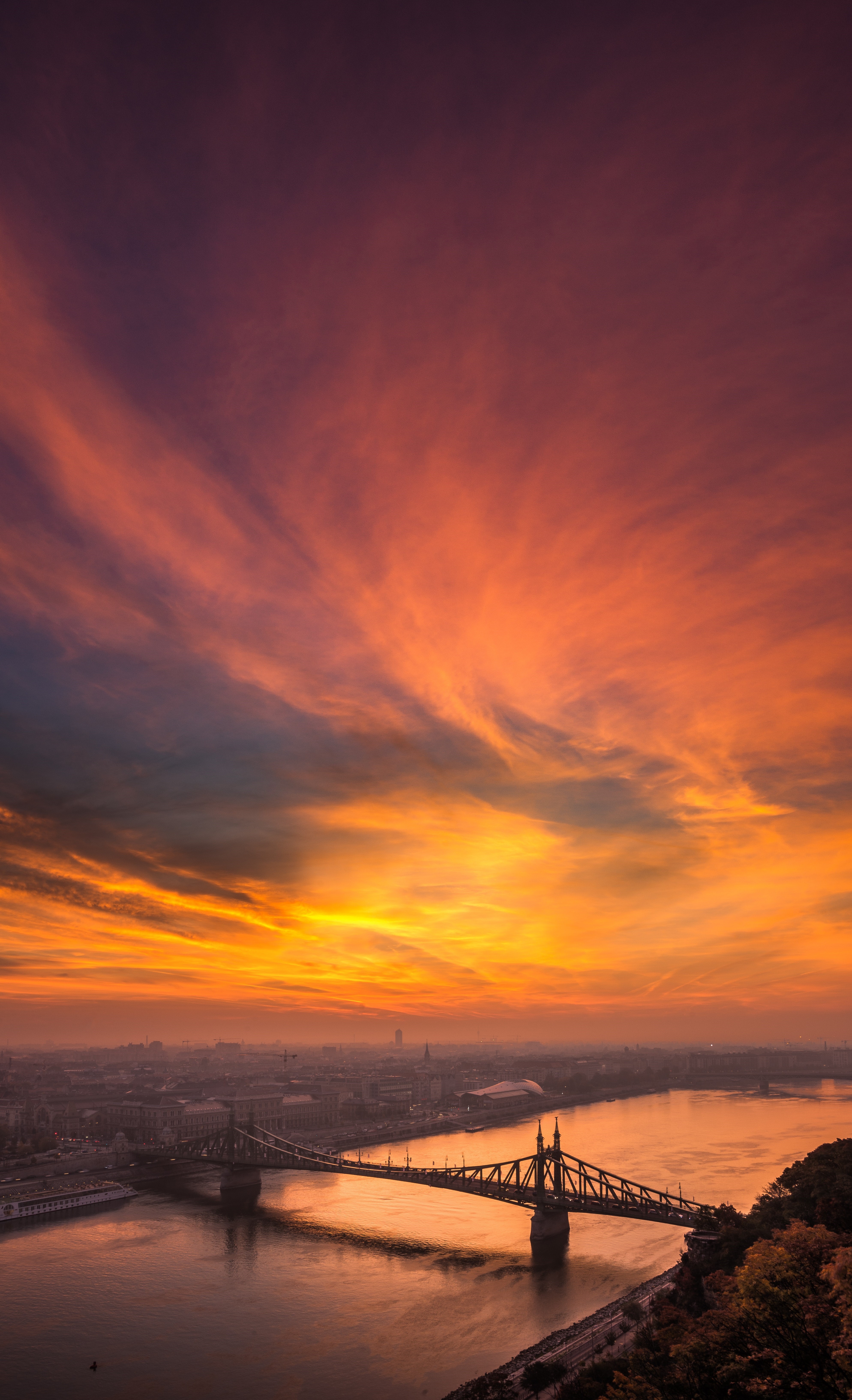 Liberty Bridge over Danube River at sunset in Budapest, Hungary HD Phone Wallpaper