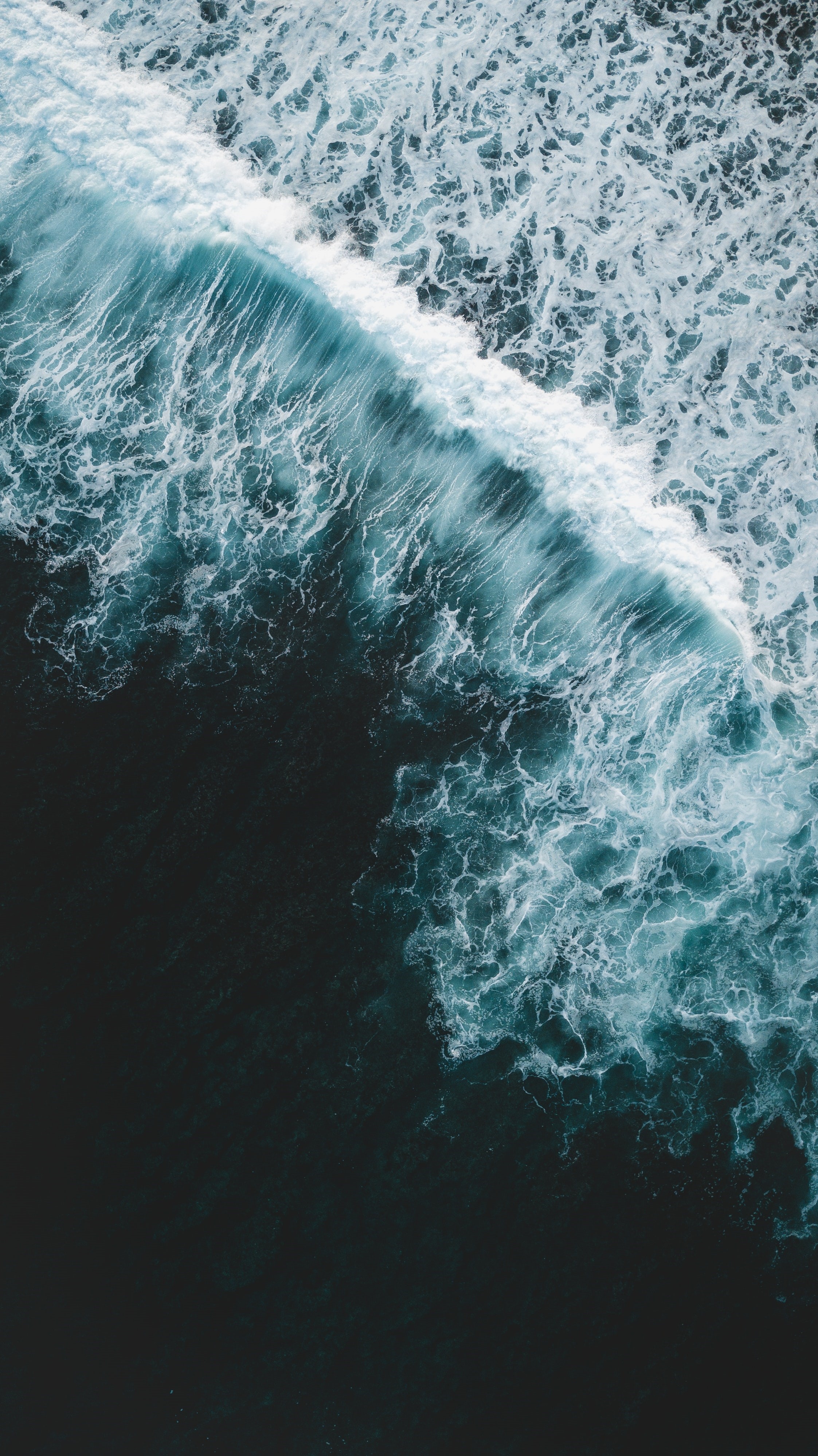 Aerial view of ocean waves crashing HD Phone Wallpaper