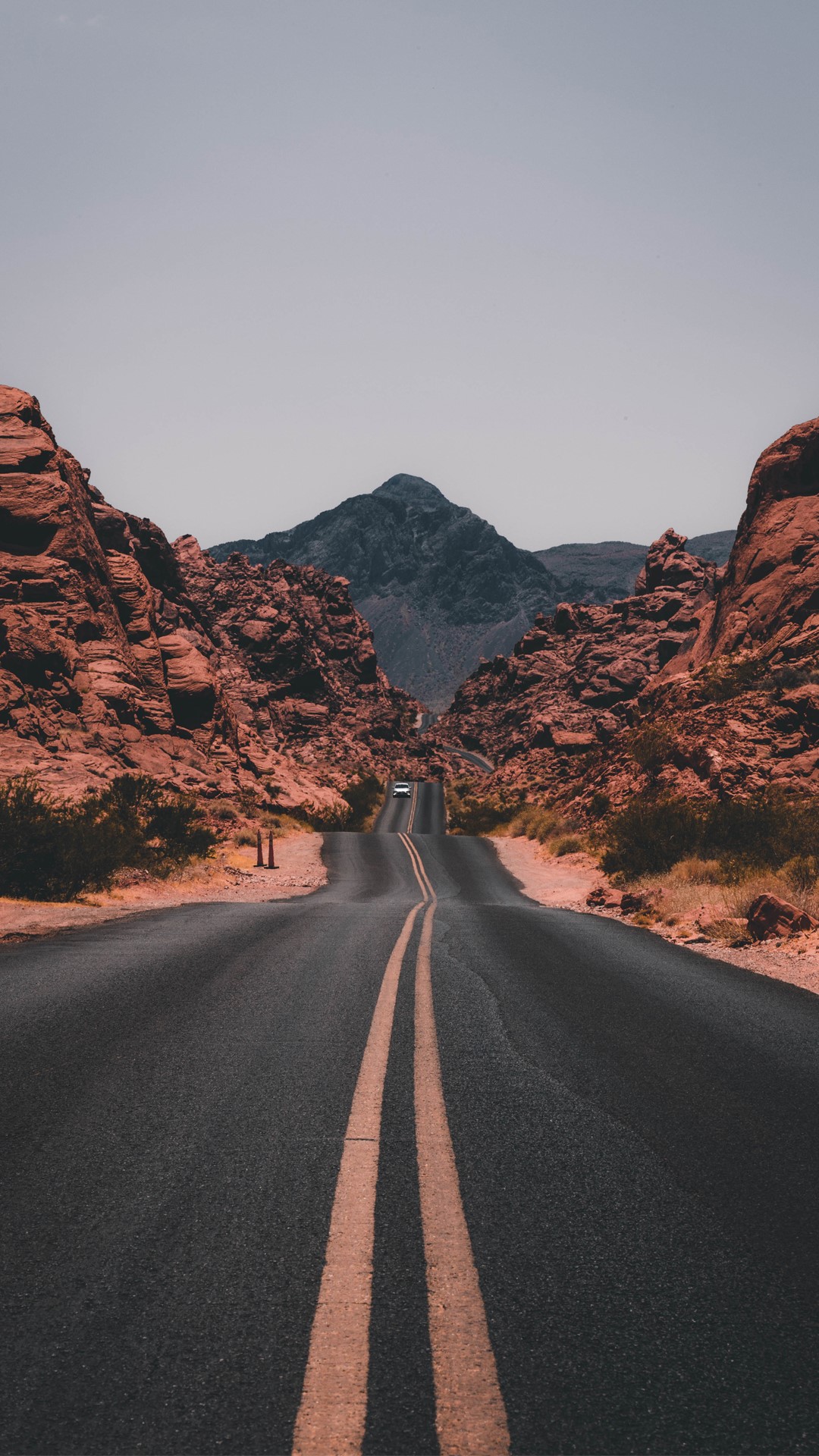 Desert road leading to mountains HD Phone Wallpaper