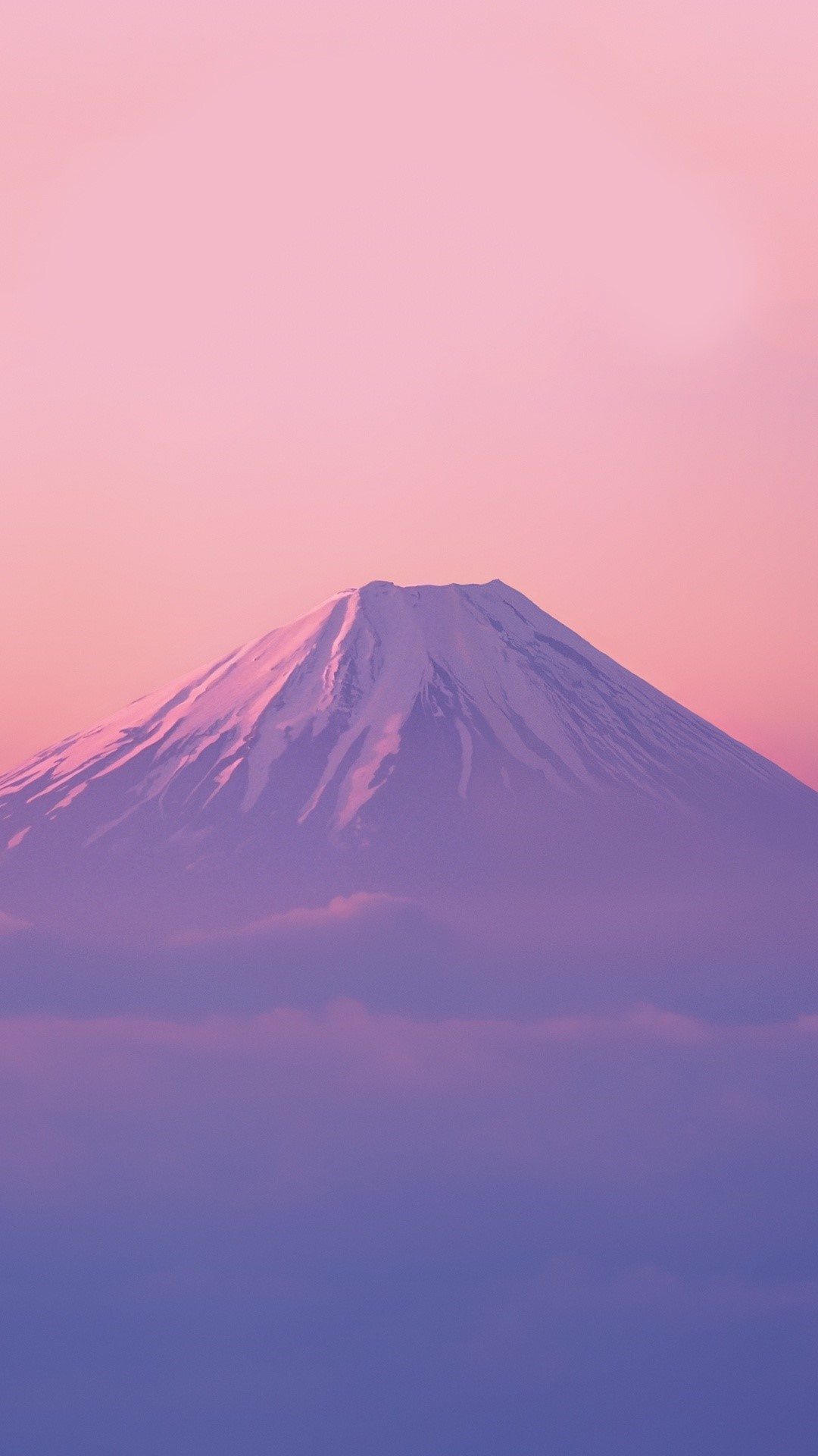 Snow-covered mountain peak above clouds at sunset HD Phone Wallpaper