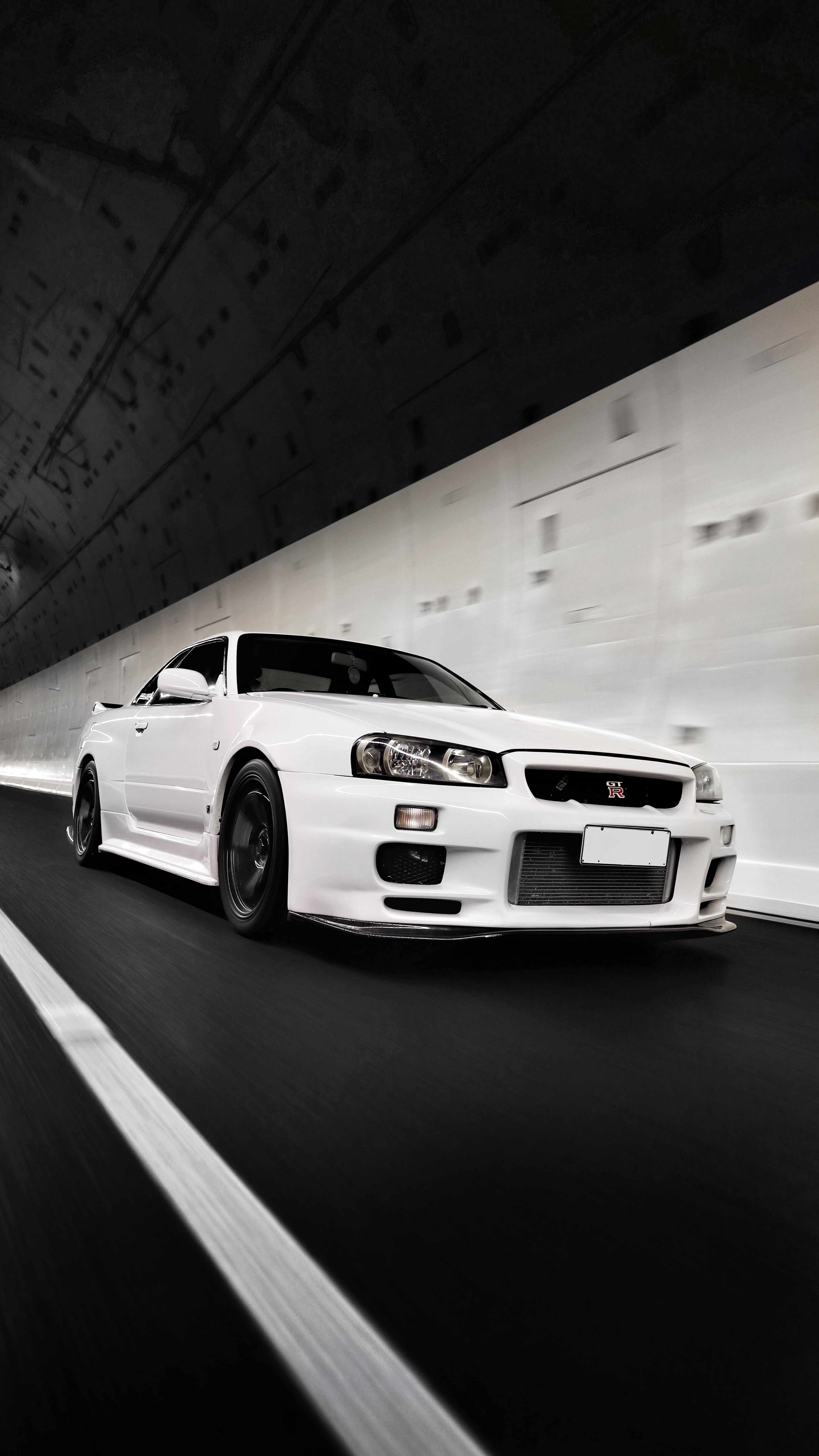White Nissan GT-R driving through a tunnel HD Phone Wallpaper
