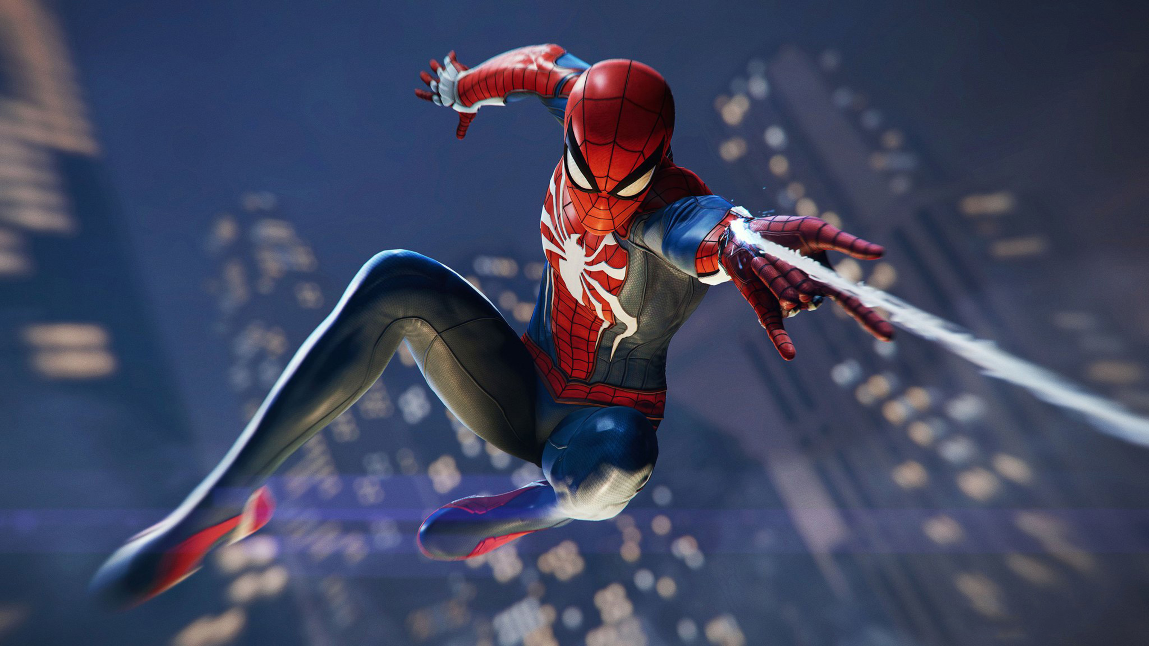 Spider-Man swinging through a city at night 4K HD Wallpaper