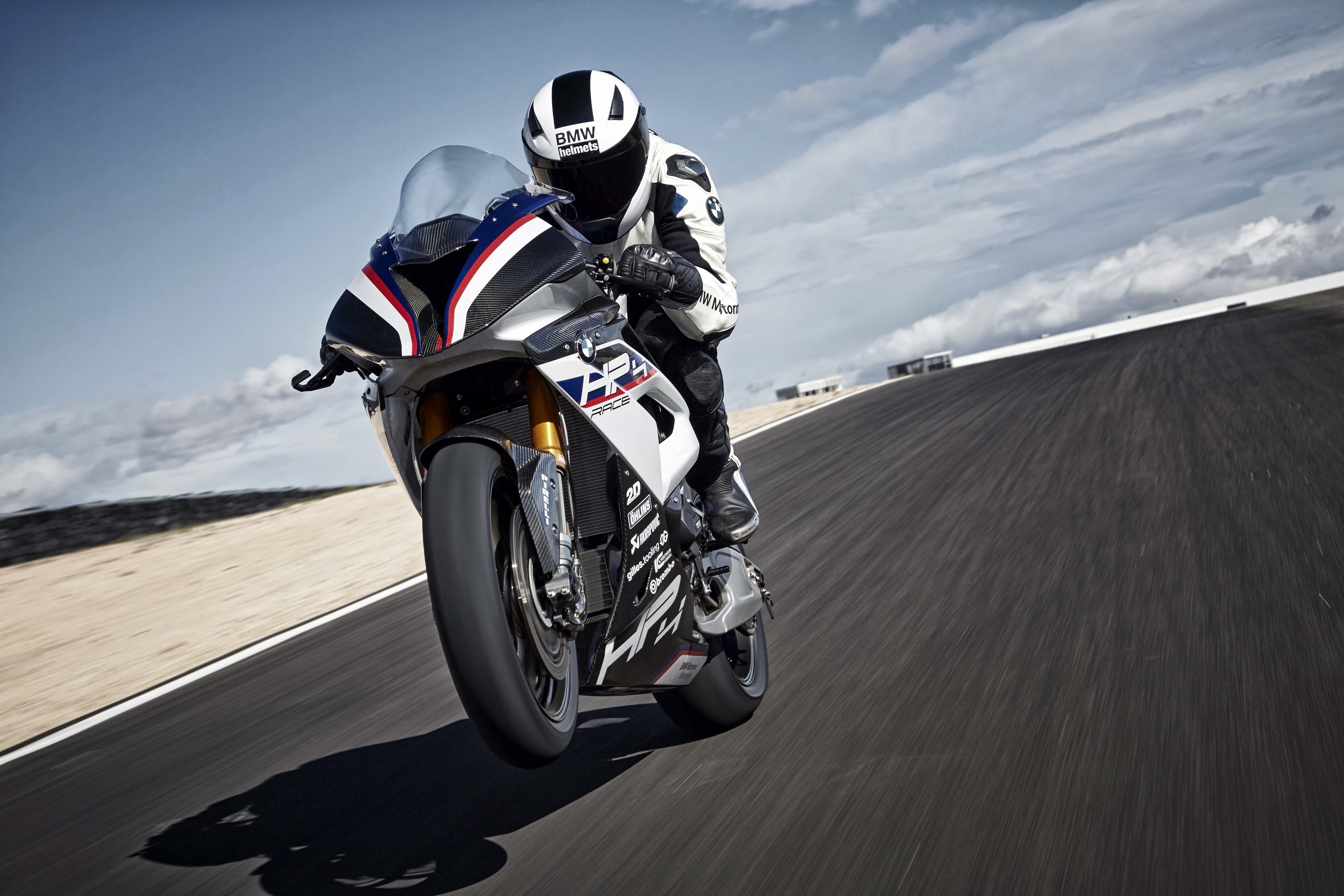 BMW HP4 Race motorcycle on a track HD Wallpaper