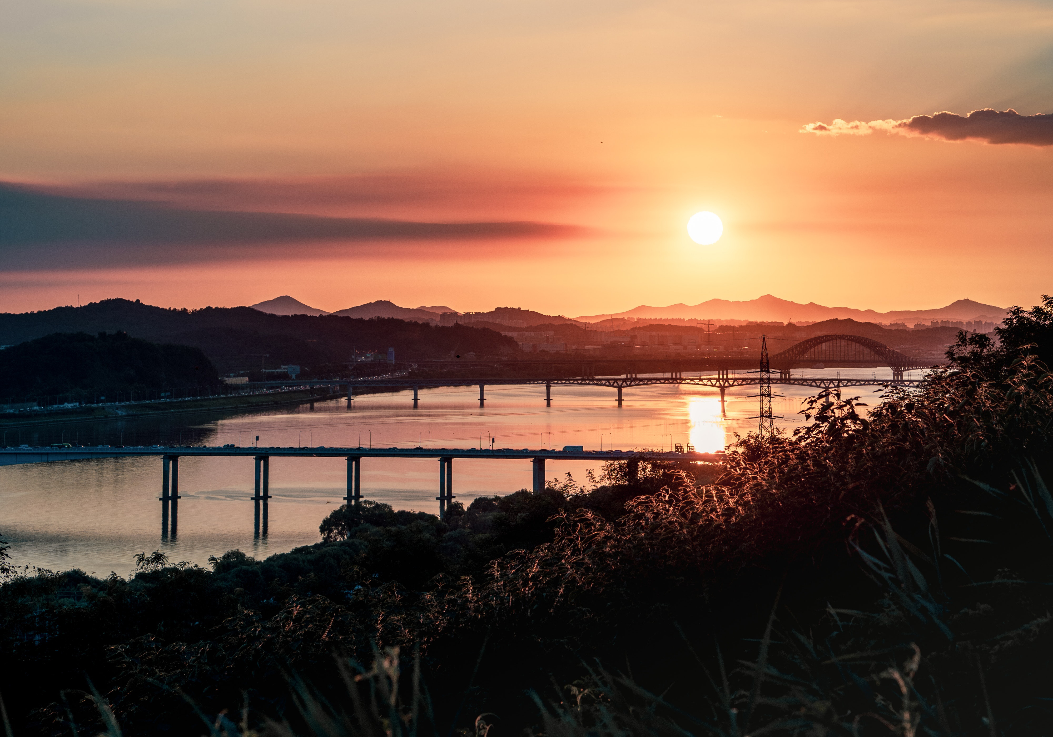 Sunset over bridges and mountains HD Wallpaper