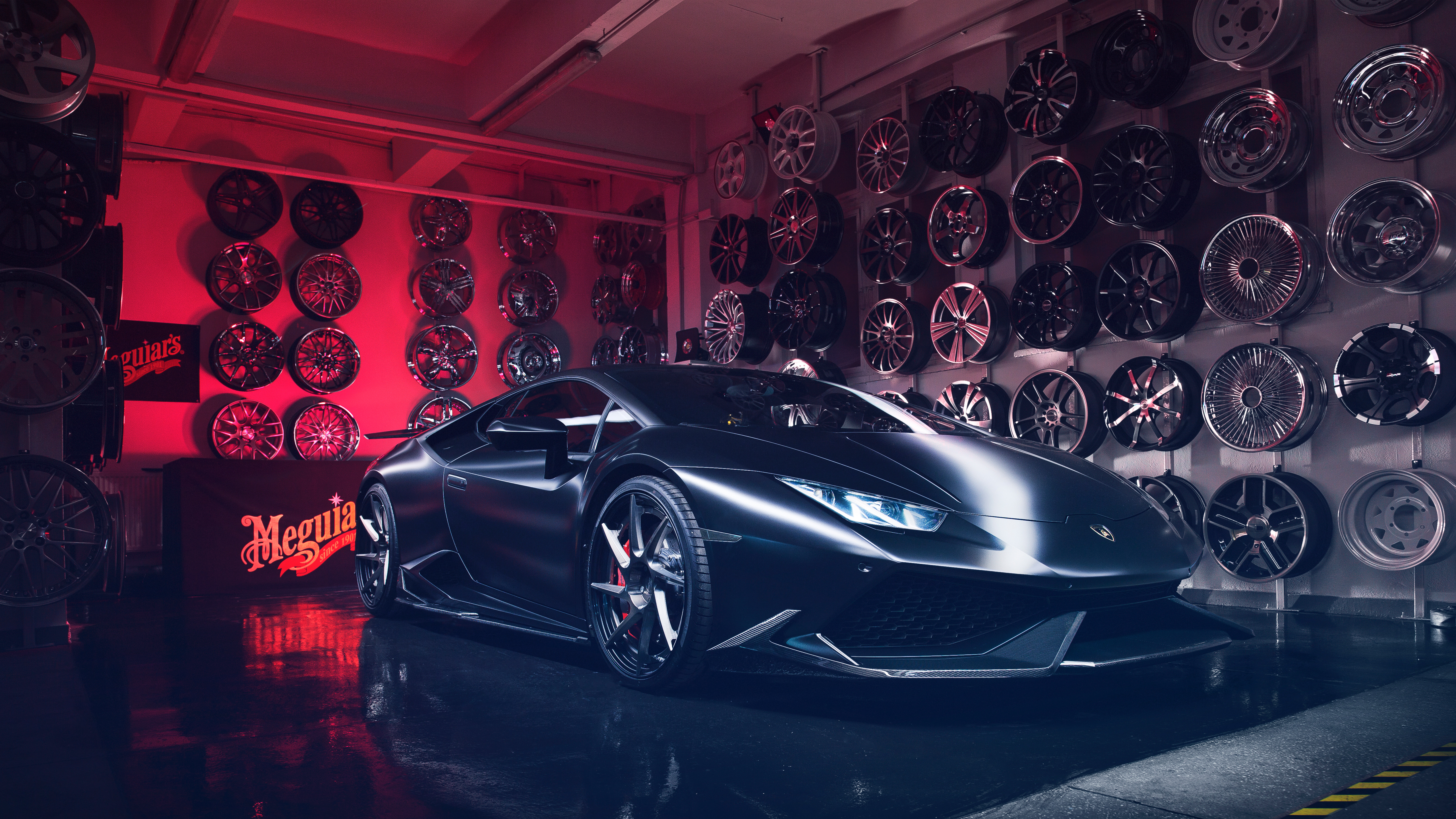 Lamborghini Huracan in a garage with wheels HD Wallpaper
