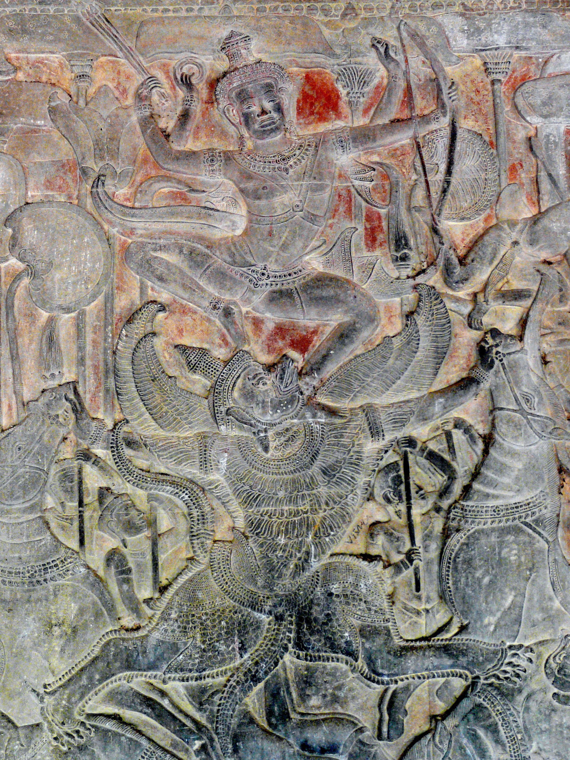 Garuda battling a demon in Hindu temple relief HD Phone Wallpaper