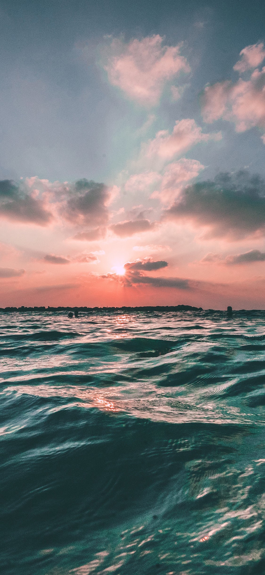 Sunset over the sea with clouds HD Phone Wallpaper