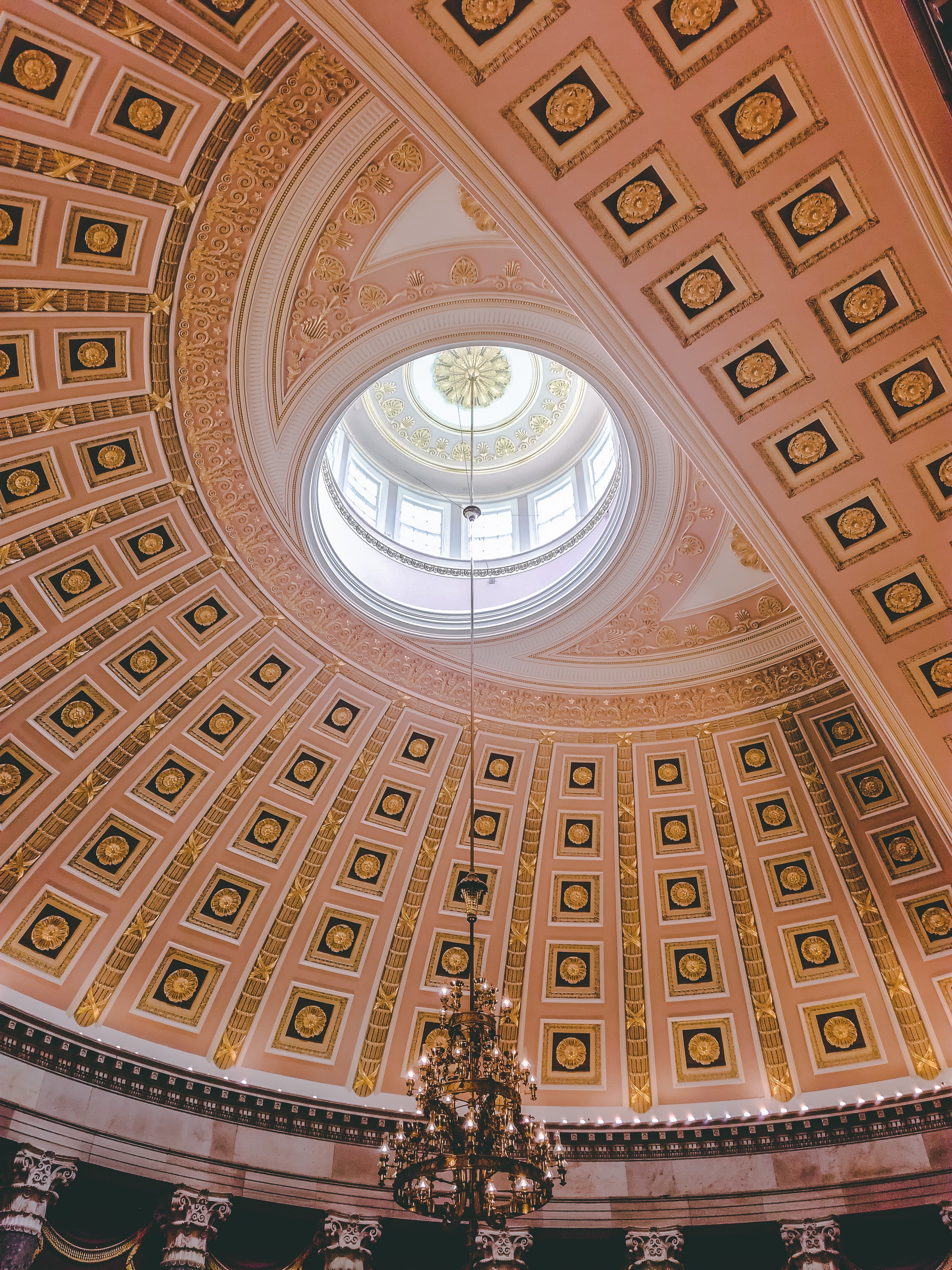 Interior of a grand dome with a chandelier HD Phone Wallpaper