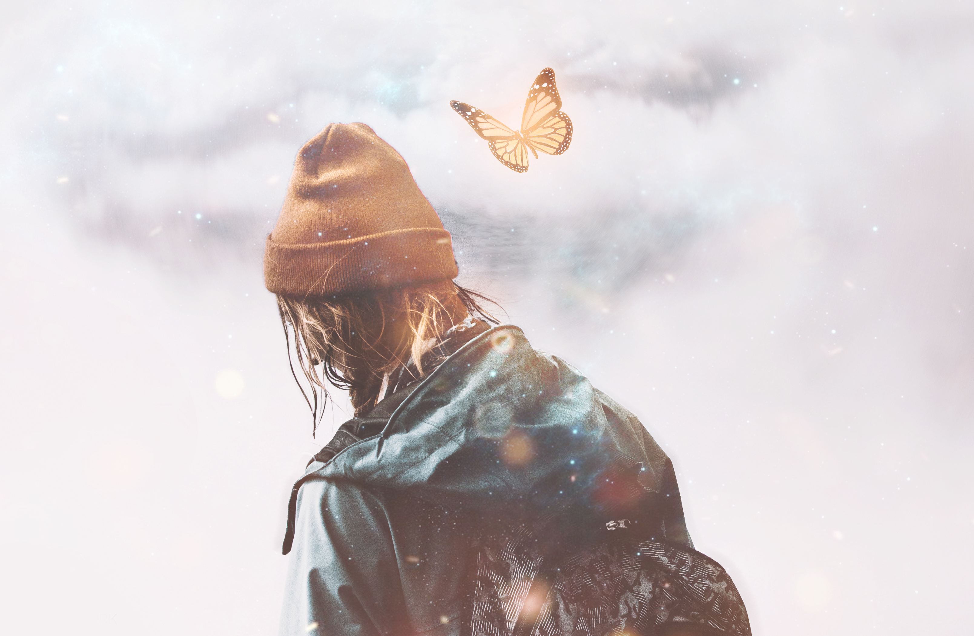 Person in beanie and jacket with butterfly HD Wallpaper