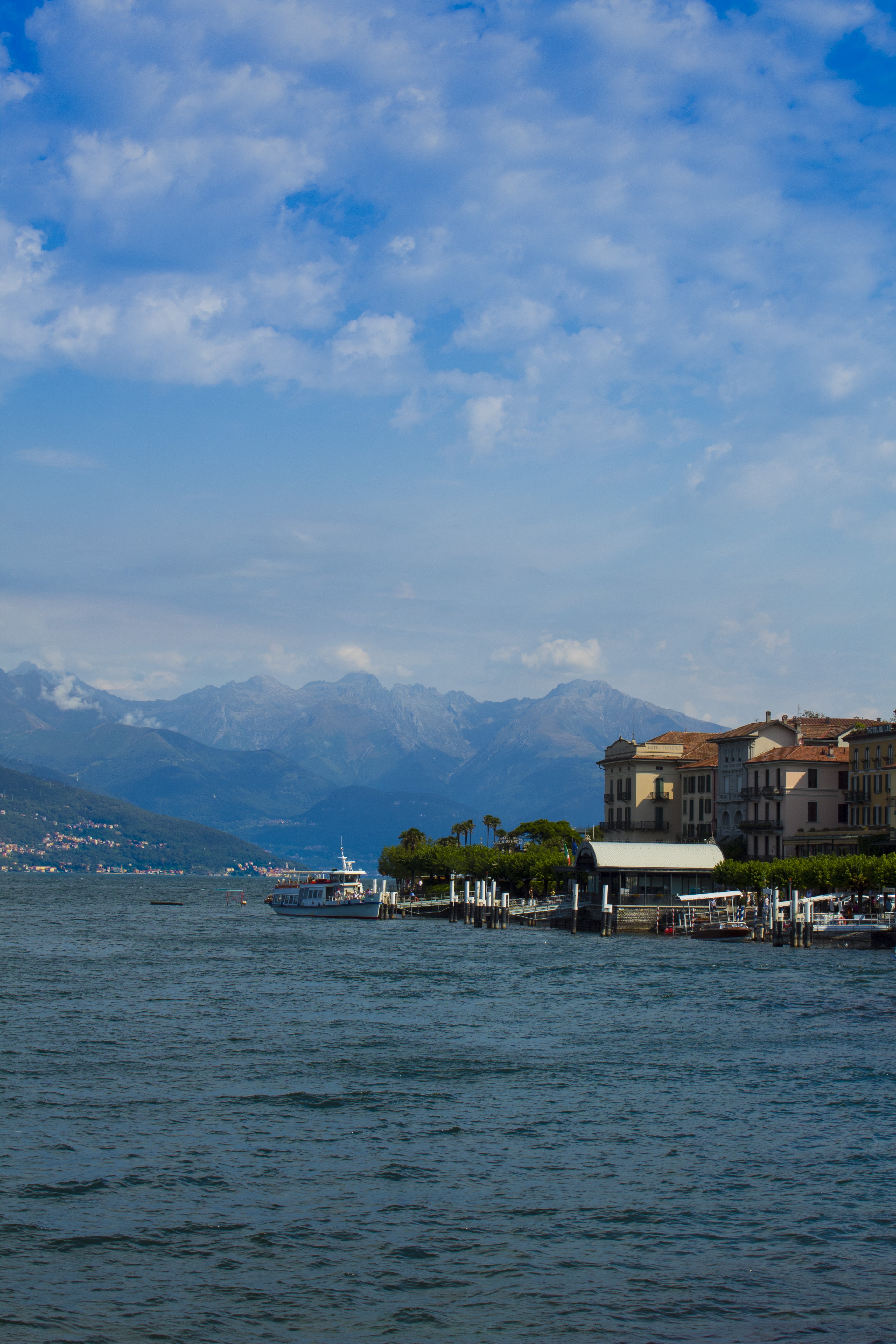 Lake Como with Mountains and Buildings in Bellagio, Italy HD Phone Wallpaper