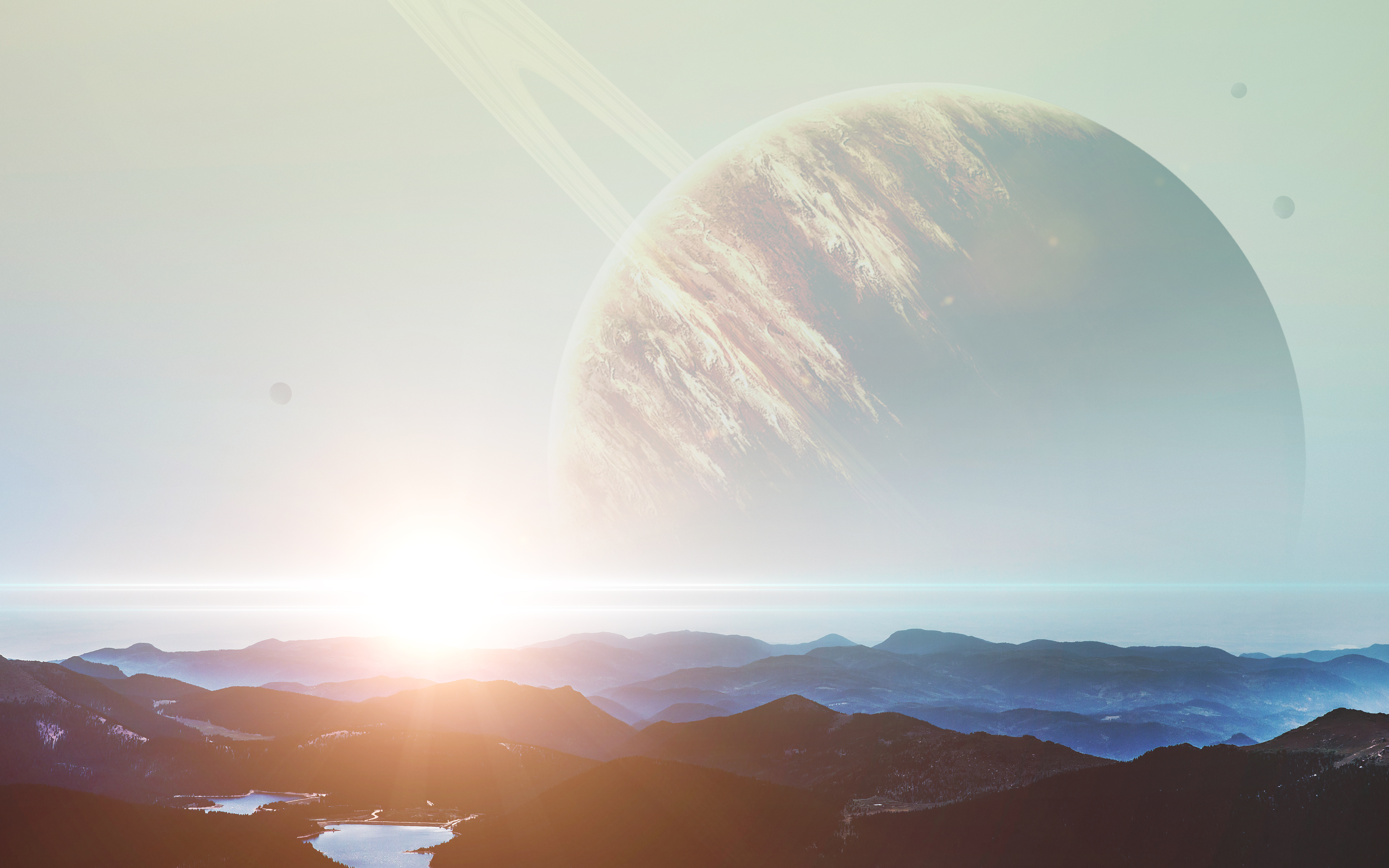 Planet with rings over mountains and lakes HD Wallpaper