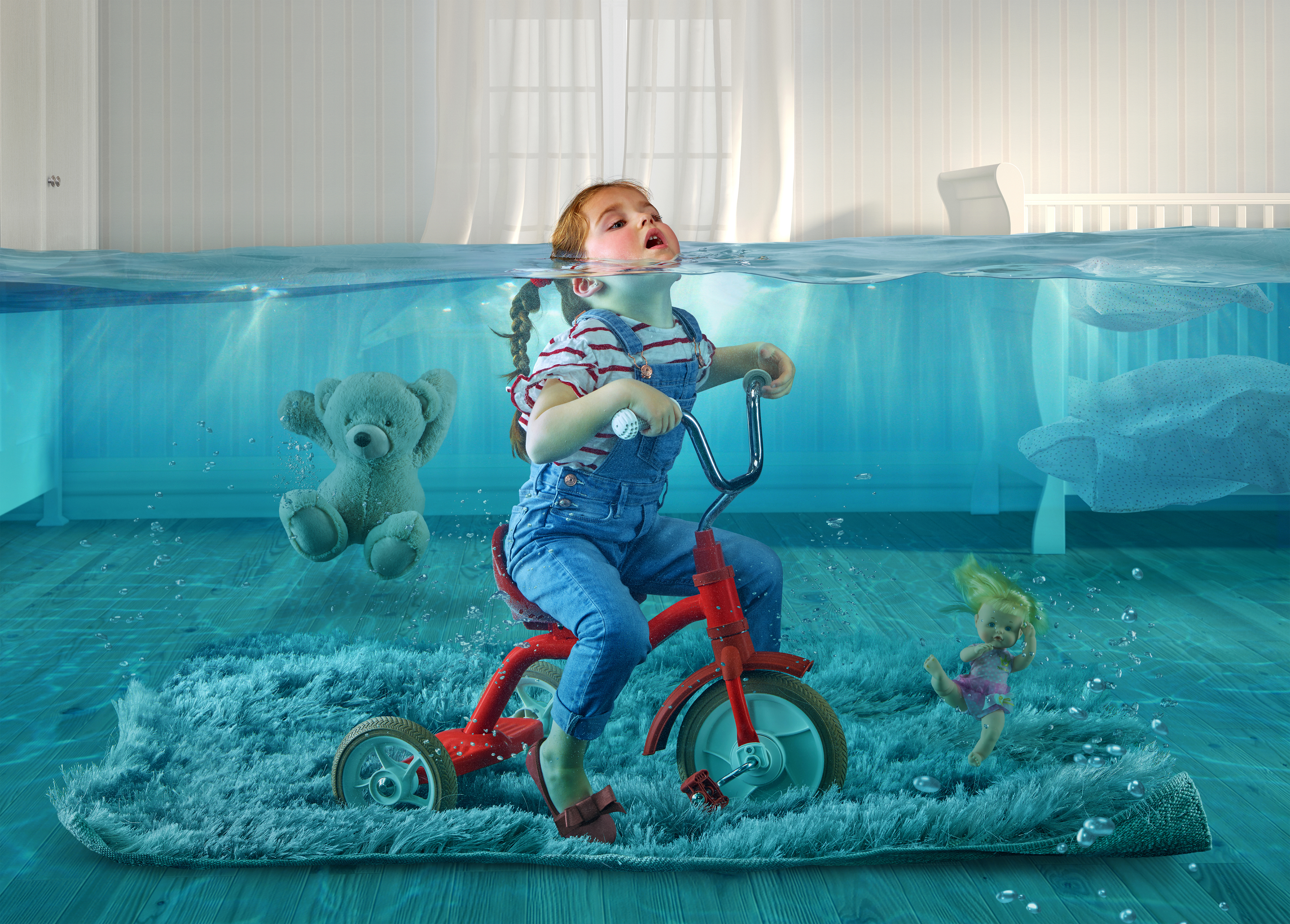 4K Underwater Toddler on Tricycle with Toys HD Wallpaper