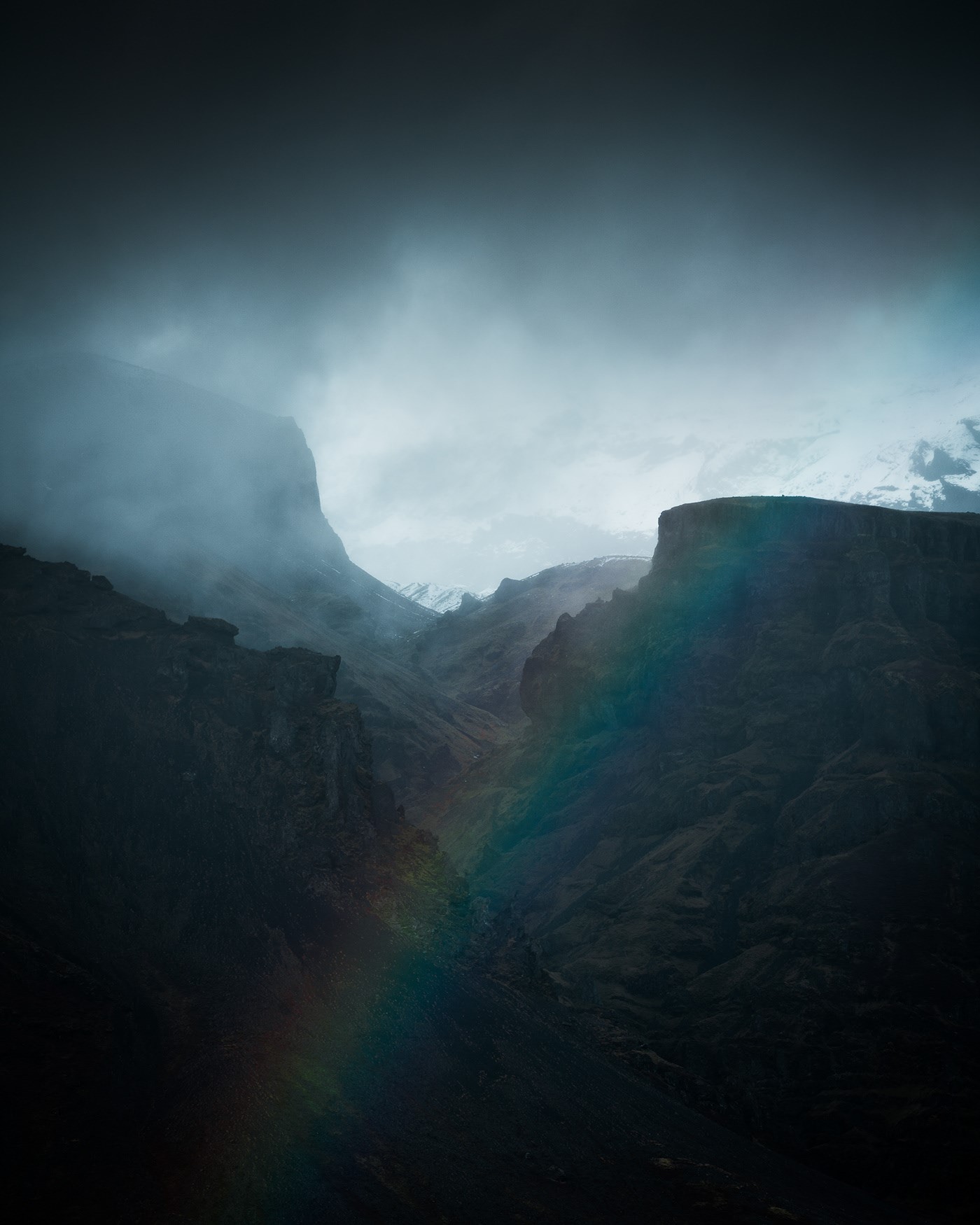 Rainbow over a misty mountain valley HD Phone Wallpaper