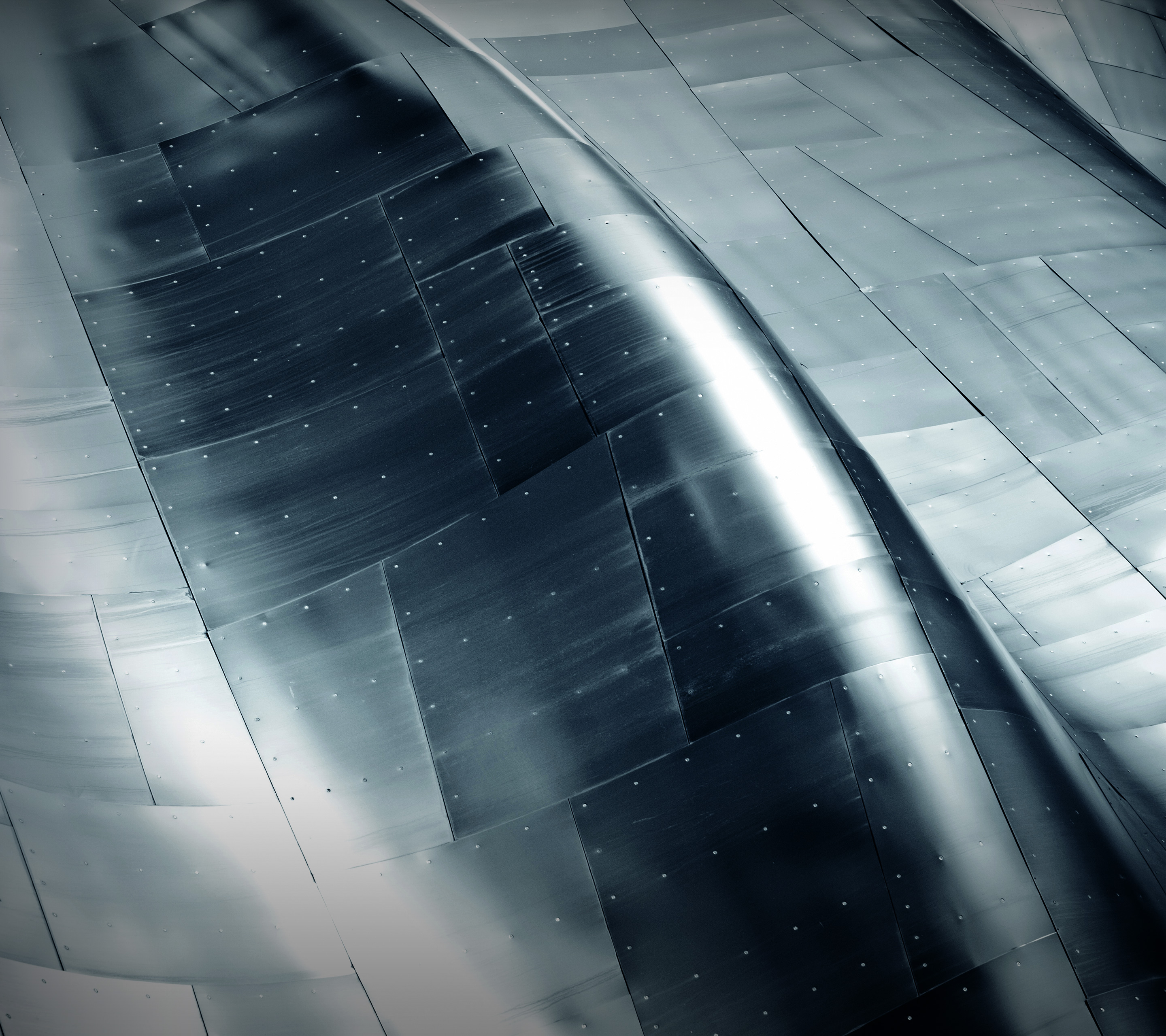 Curved metal panels with rivets HD Wallpaper