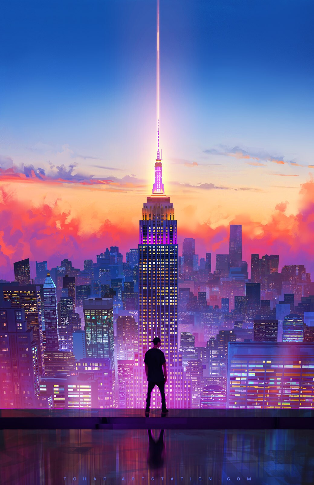 Empire State Building with a light beam at sunset HD Phone Wallpaper
