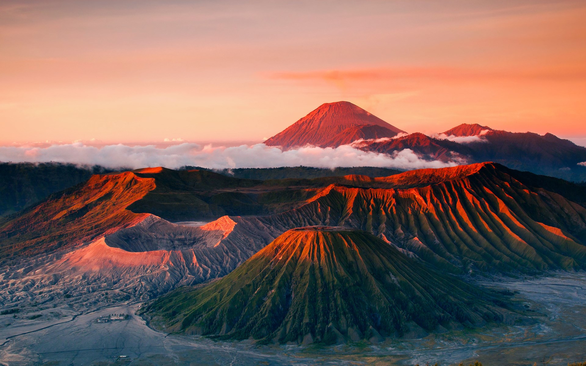 Volcanoes at sunrise with orange sky HD Wallpaper