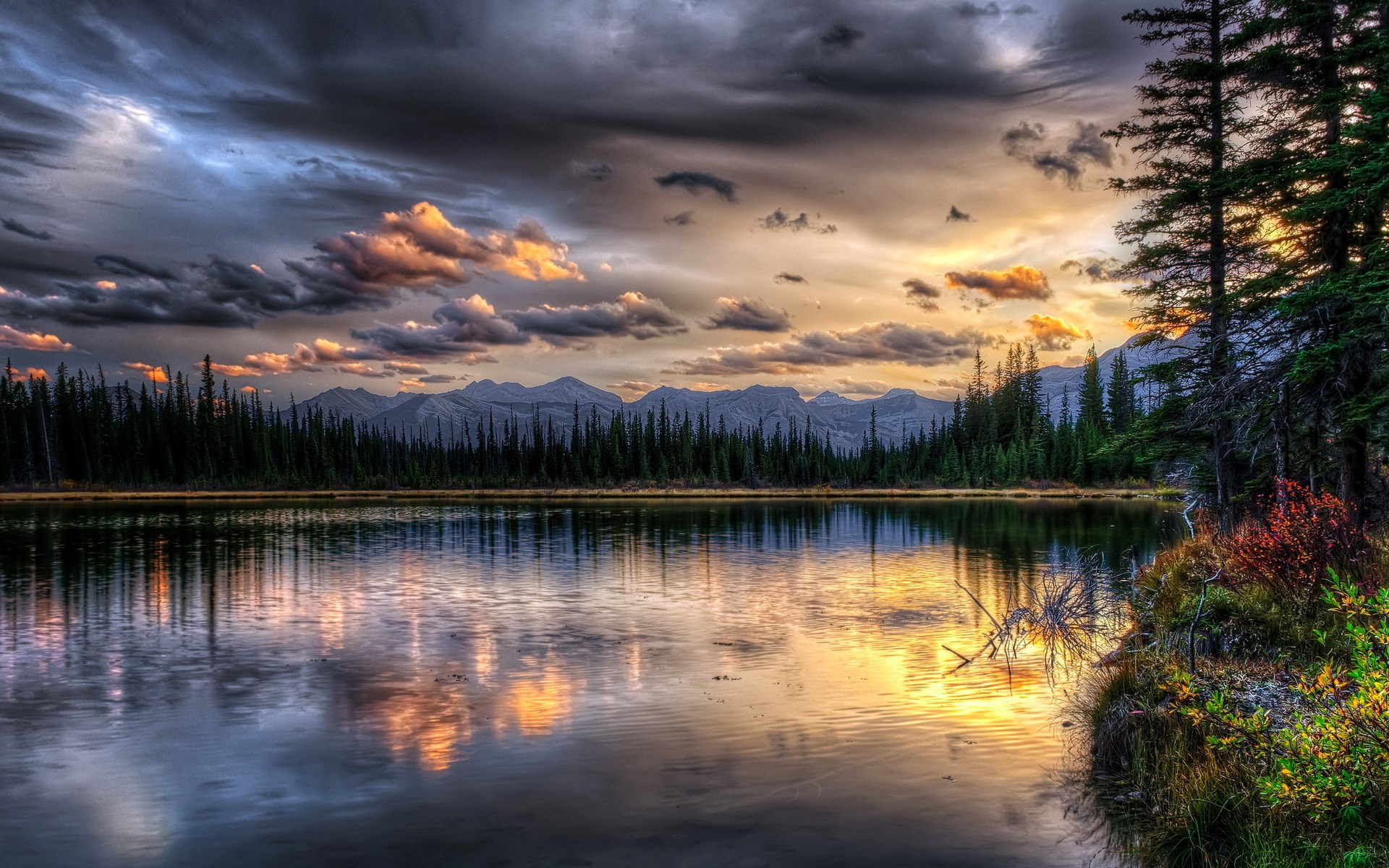 Lake and mountains at sunset with dramatic clouds HD Wallpaper