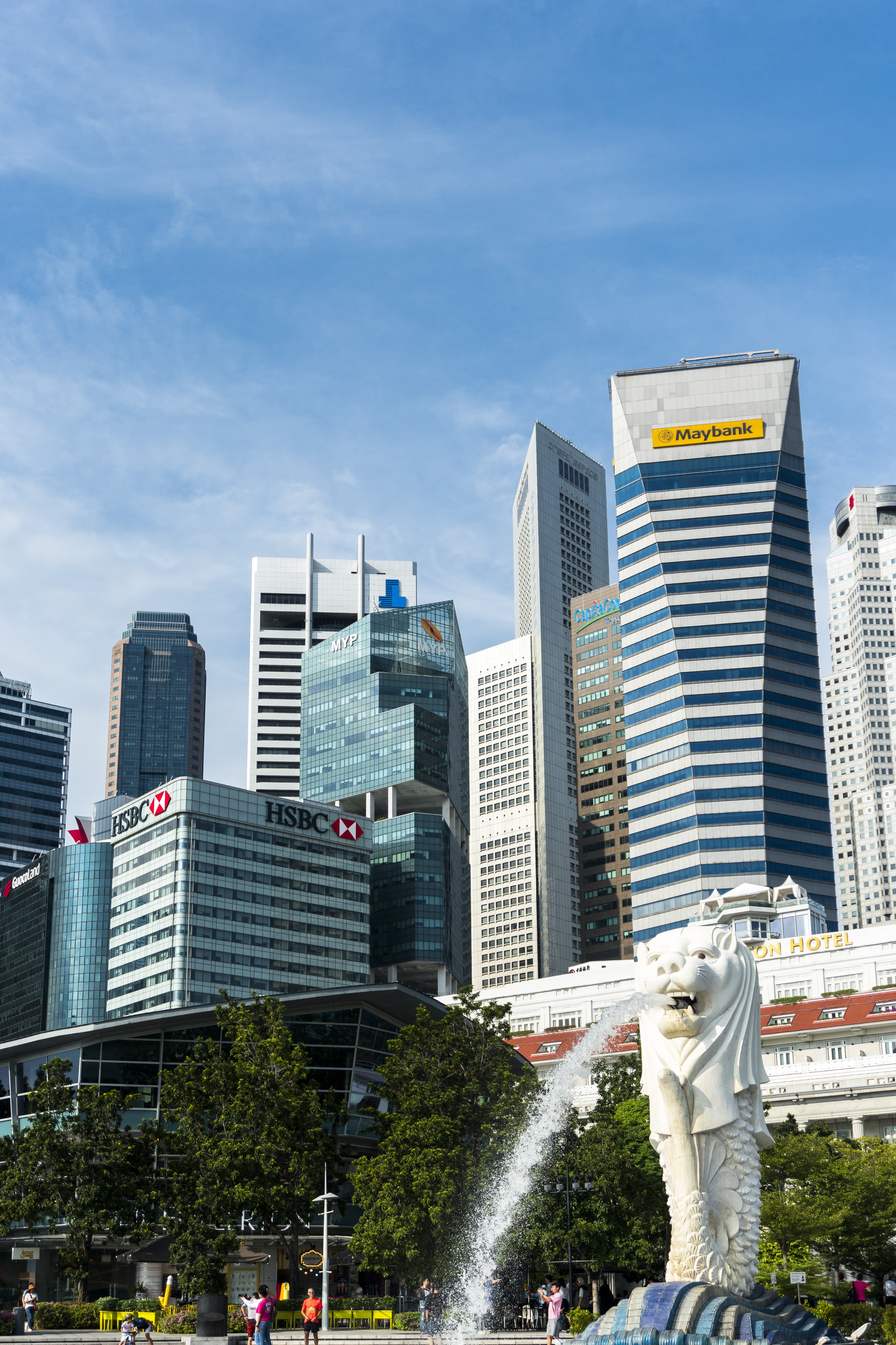 Merlion statue with Singapore skyline and Maybank building HD Phone Wallpaper