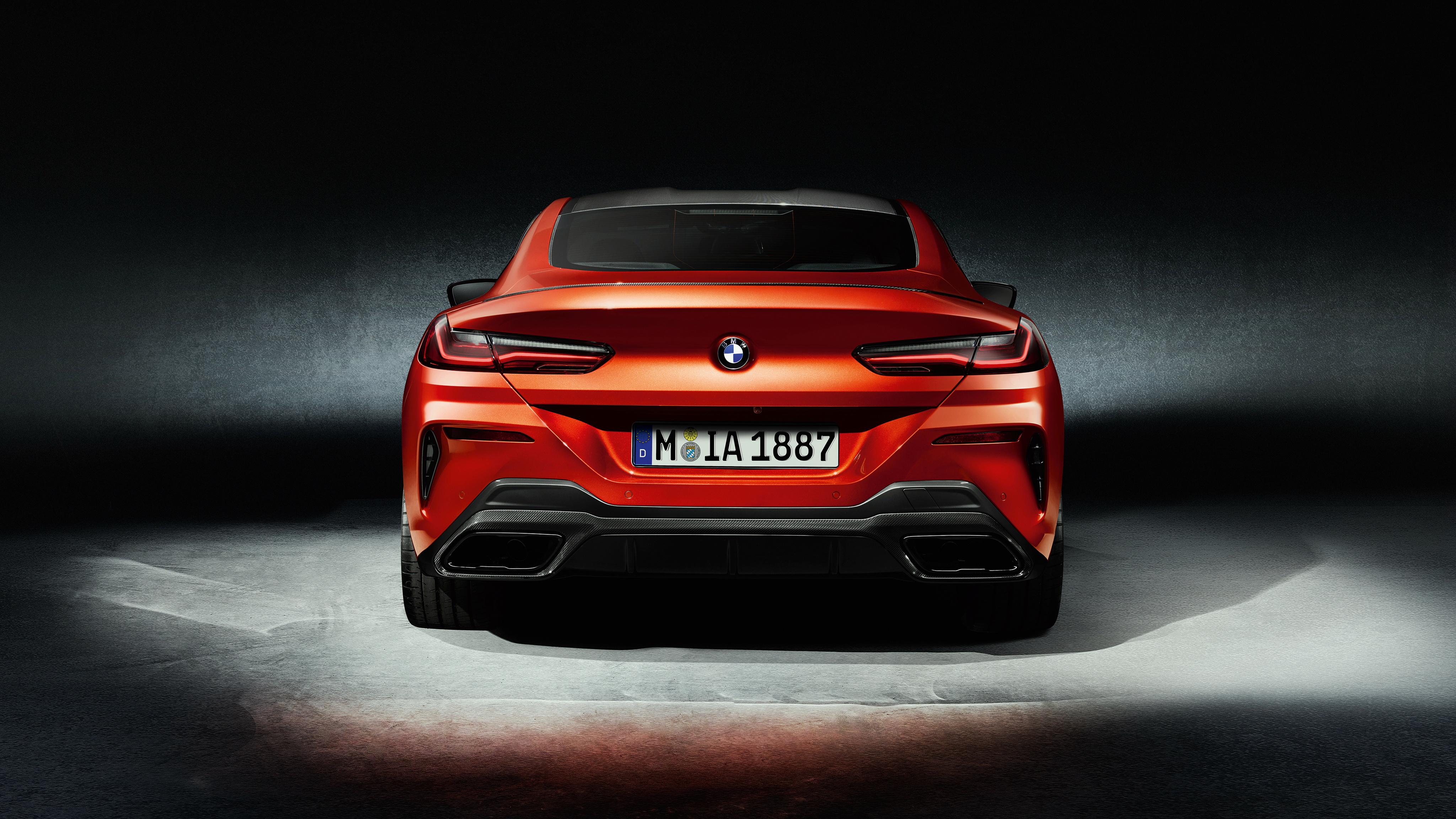 BMW M850i xDrive Sunset Orange 4K Rear View HD Wallpaper