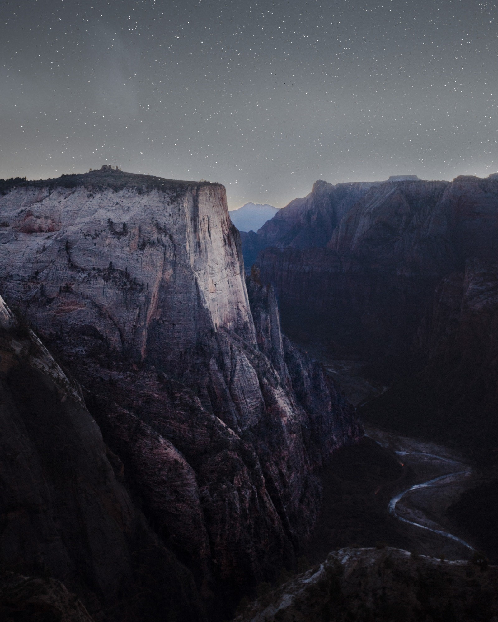 Majestic mountain range under a starry night sky HD Phone Wallpaper