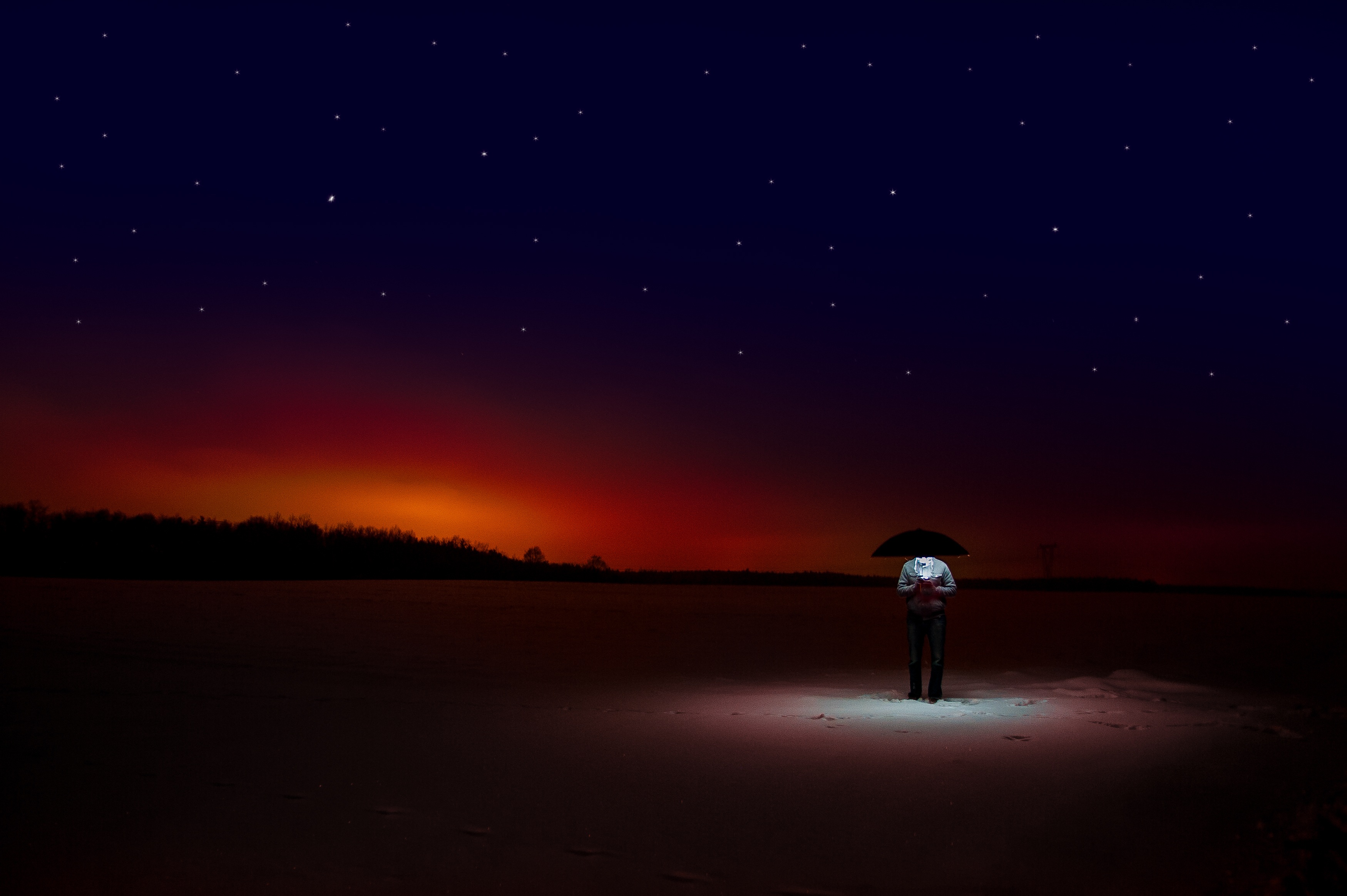 Man with umbrella under starry dusk sky HD Wallpaper