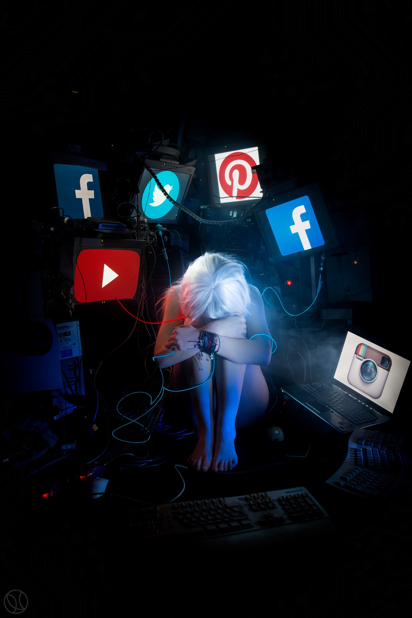 Person surrounded by social media logos on screens HD Phone Wallpaper
