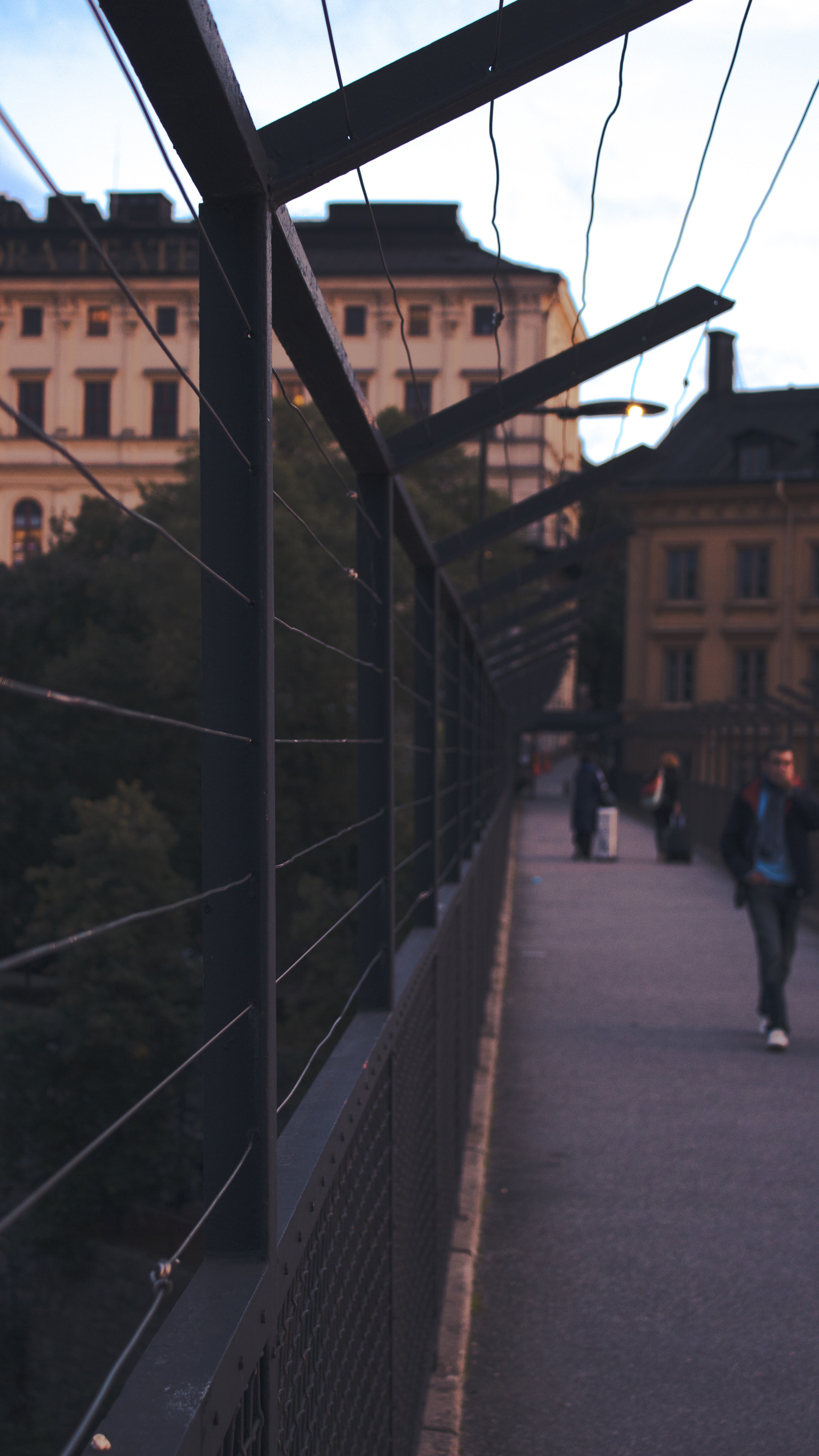 People walking on a bridge in Stockholm, Sweden HD Phone Wallpaper