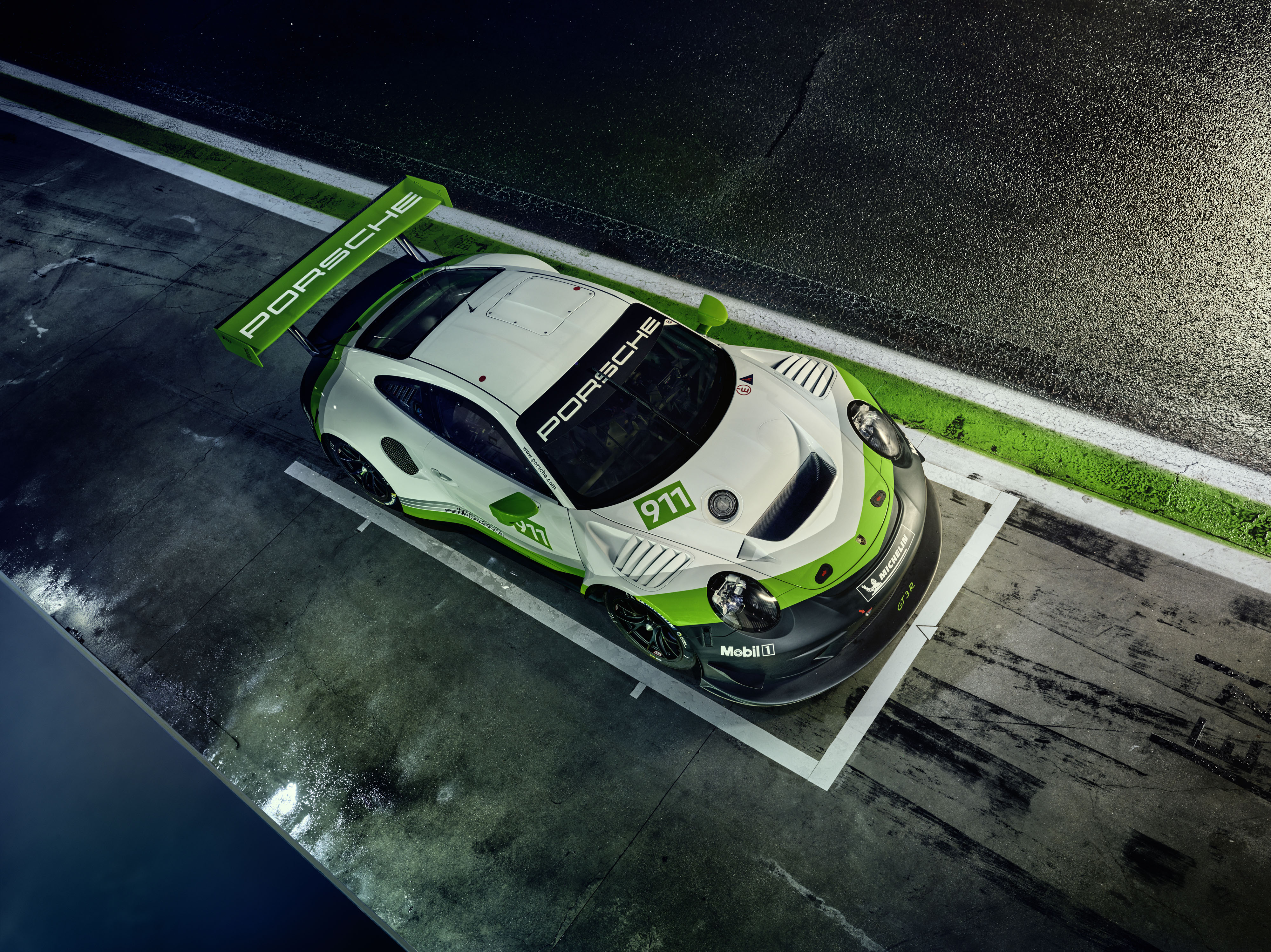 4K Porsche 911 GT3 R race car on track HD Wallpaper