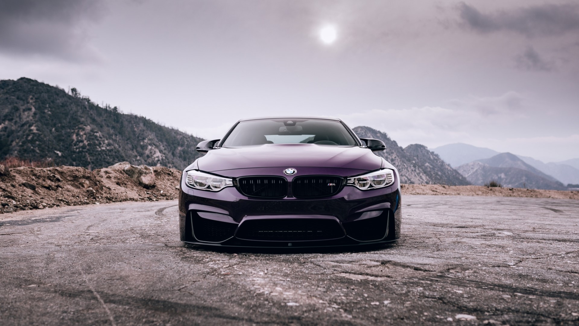 Purple BMW M4 on a Mountain Road HD Wallpaper