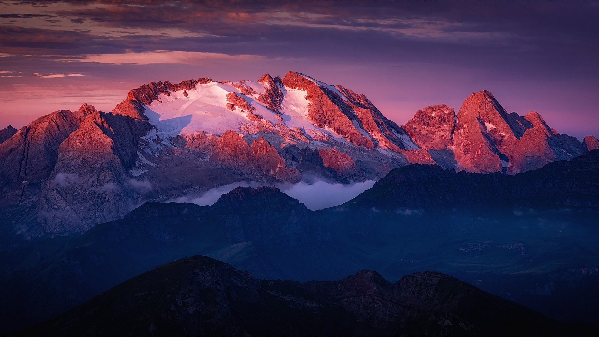 Mountains at sunrise with pink and purple sky HD Wallpaper