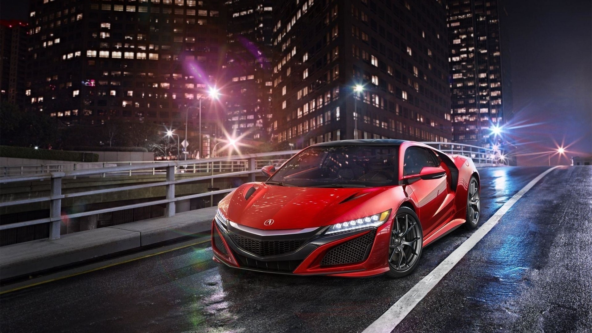 Red Acura NSX sports car on a wet city street at night HD Wallpaper