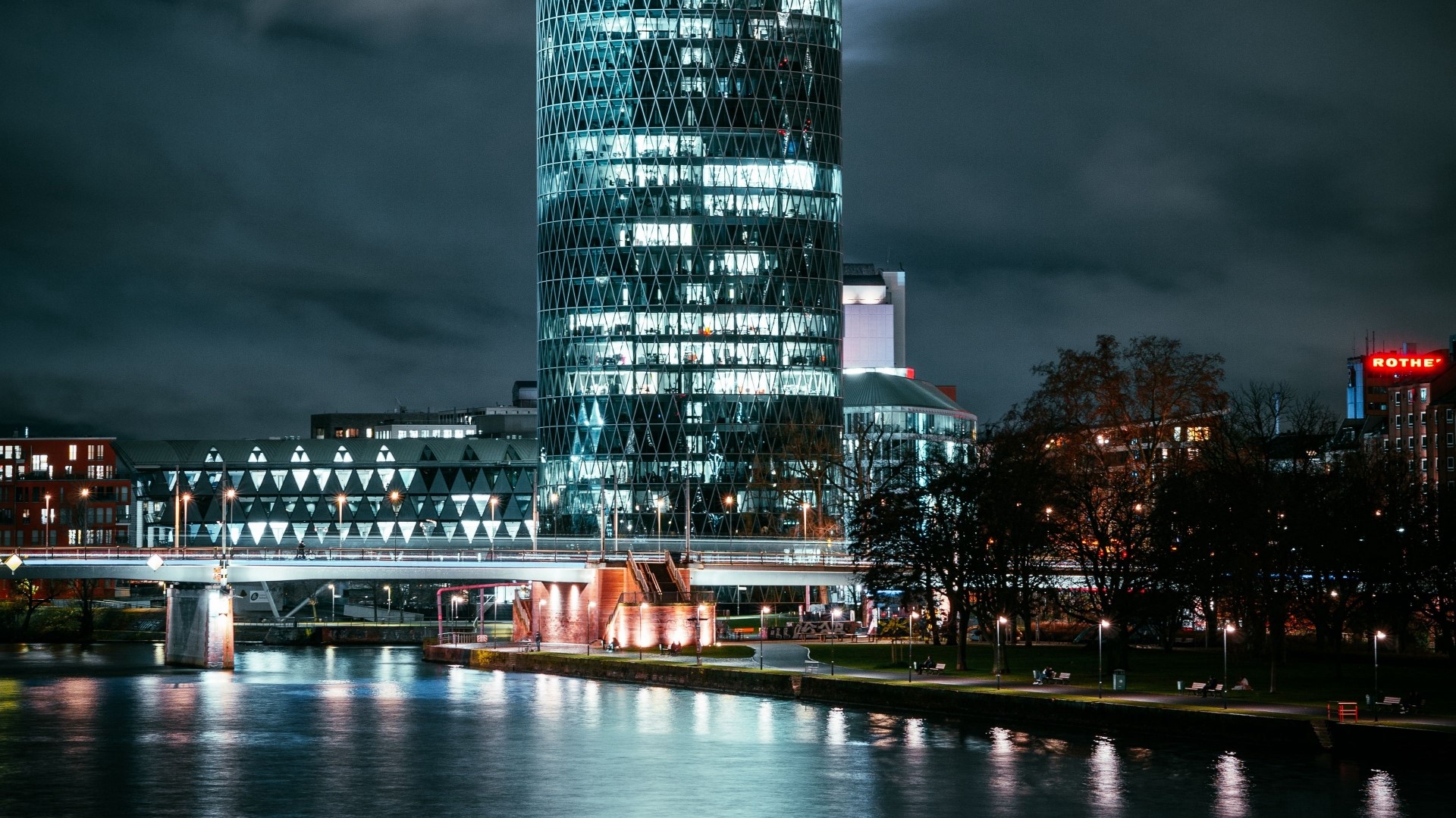 Night cityscape with river and modern buildings HD Wallpaper