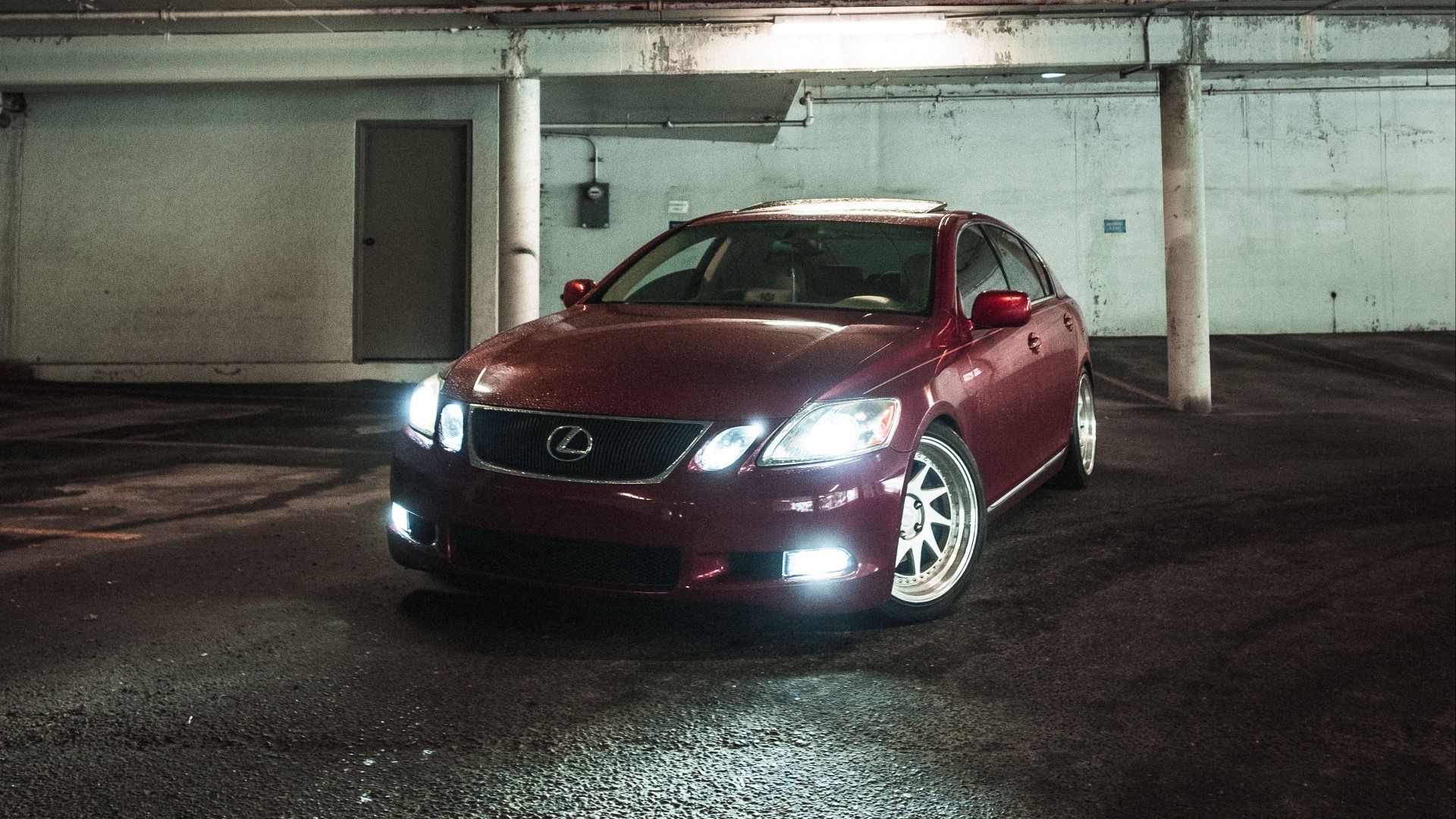 Red Lexus GS parked in a concrete garage HD Wallpaper