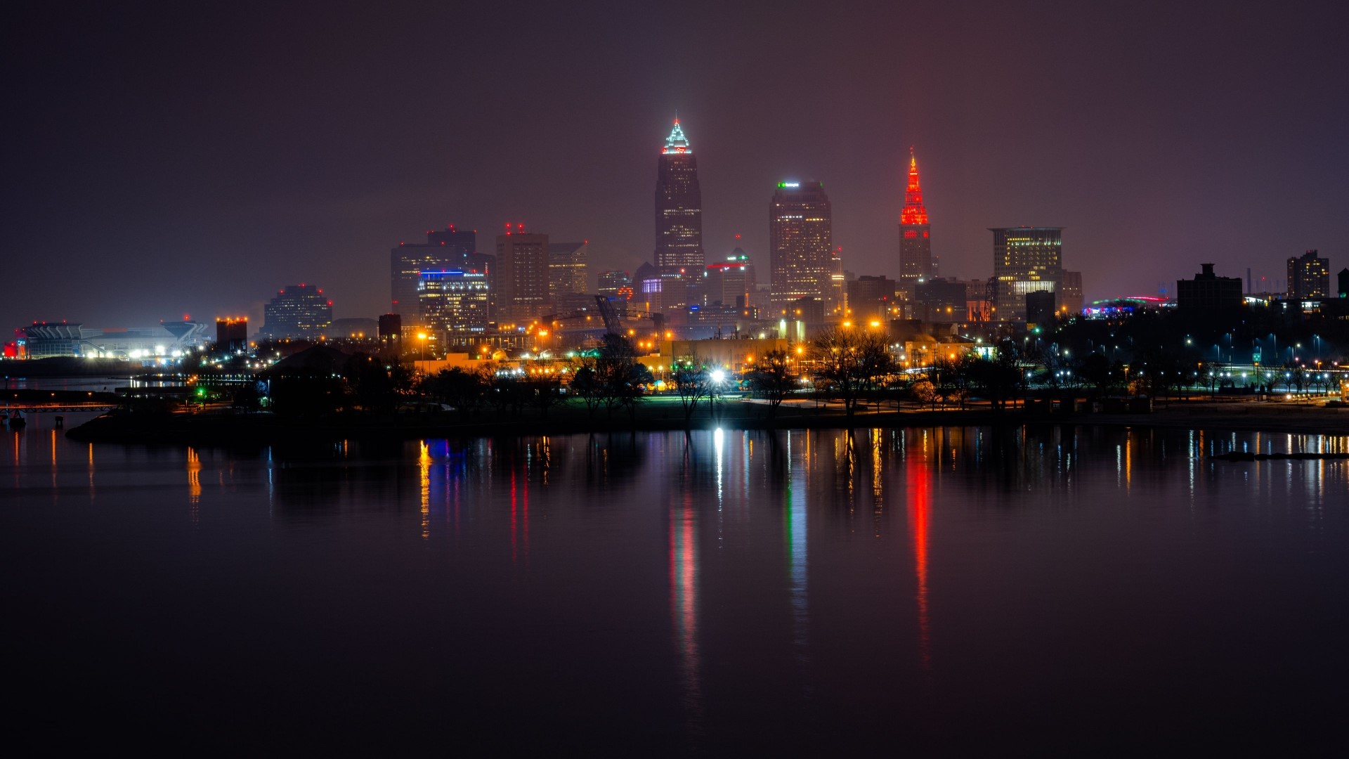 Cleveland skyline at night with reflections HD Wallpaper