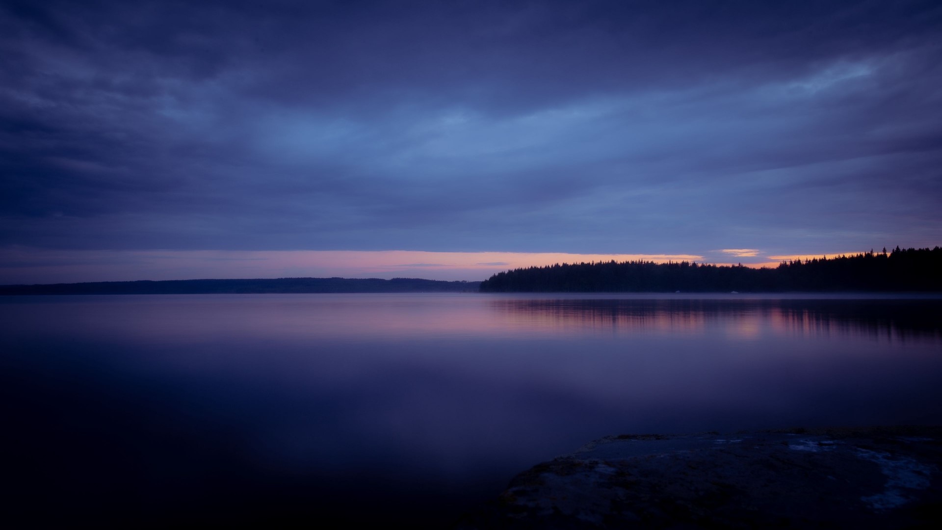 Lake at dusk with forest silhouette HD Wallpaper
