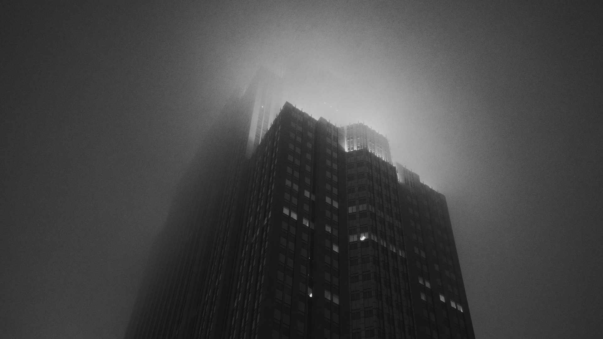 Skyscraper in fog HD Wallpaper