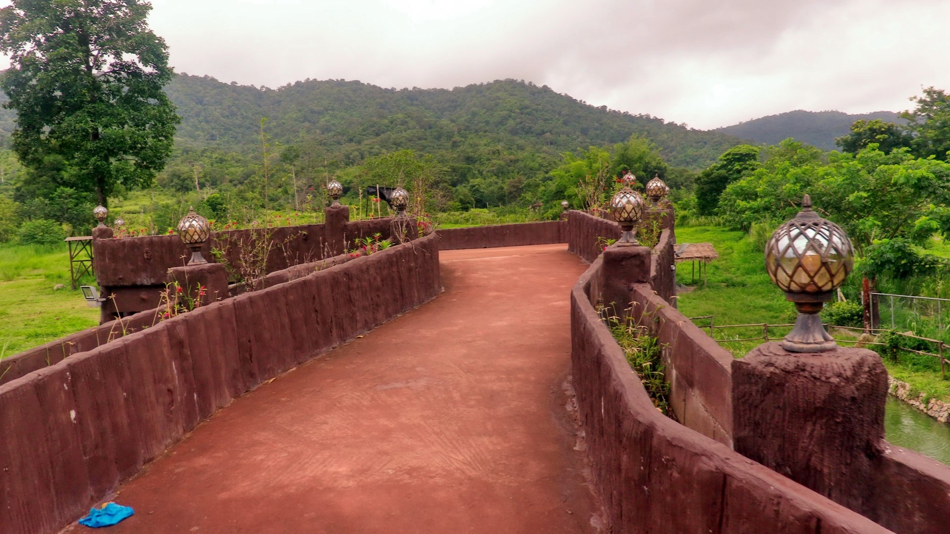 Pathway with lamps and mountains in Thailand HD Wallpaper