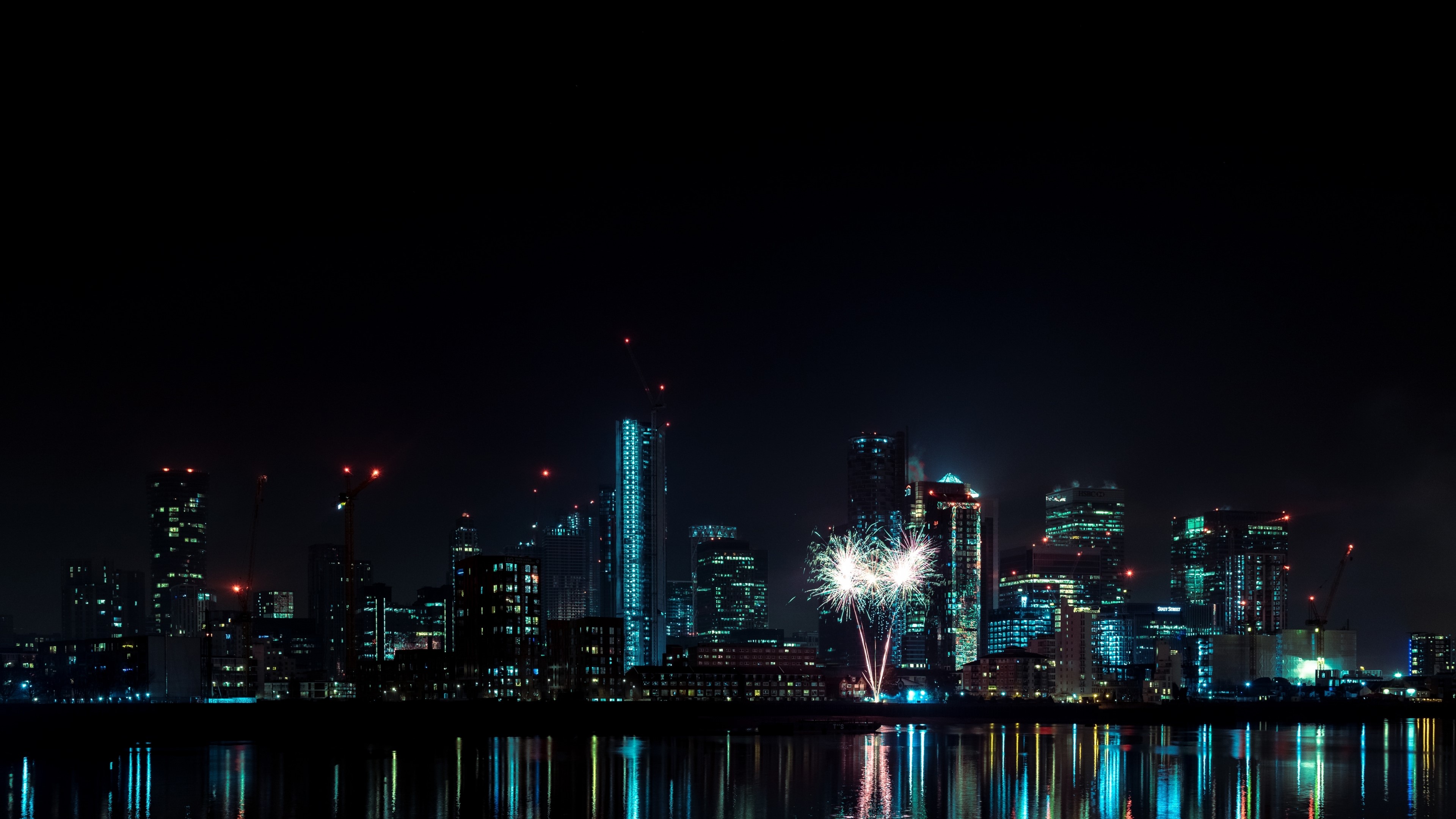 4K Night City Skyline with Fireworks HD Wallpaper