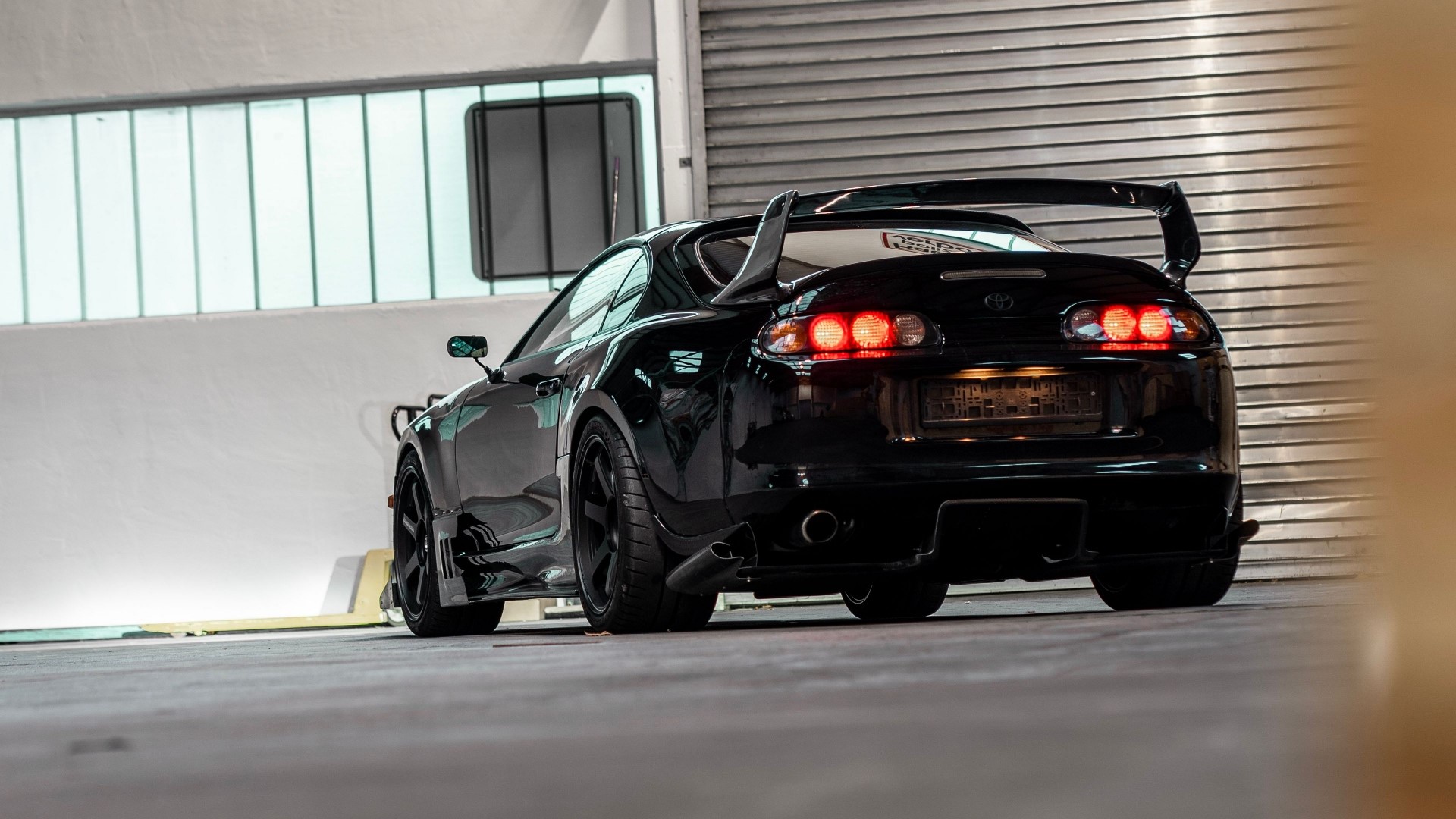 Black Toyota Supra in a garage HD Wallpaper