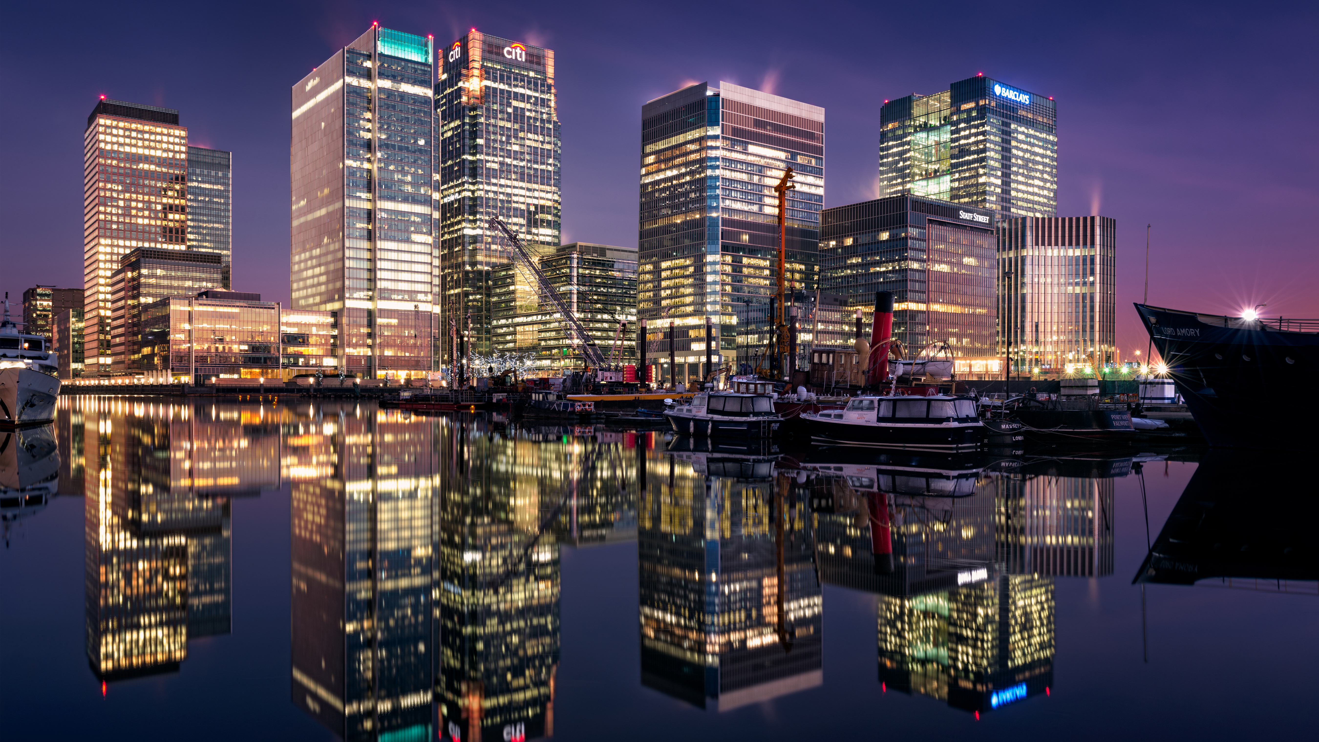 Canary Wharf skyscrapers reflected in water at dusk HD Wallpaper