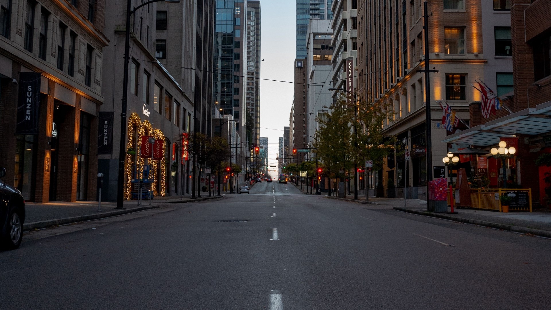 Street view of downtown buildings and road HD Wallpaper
