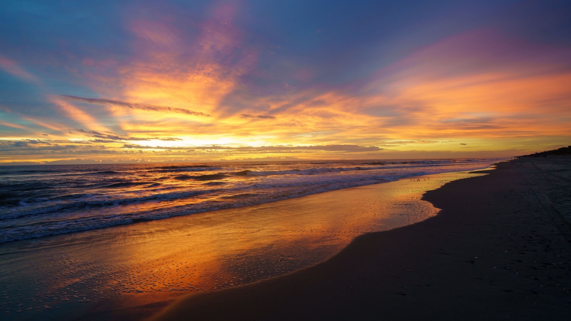 Sunset over the ocean with colorful clouds HD Wallpaper