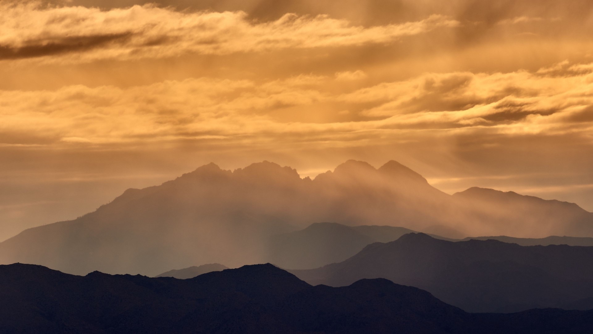 Mountain range at dusk with clouds HD Wallpaper