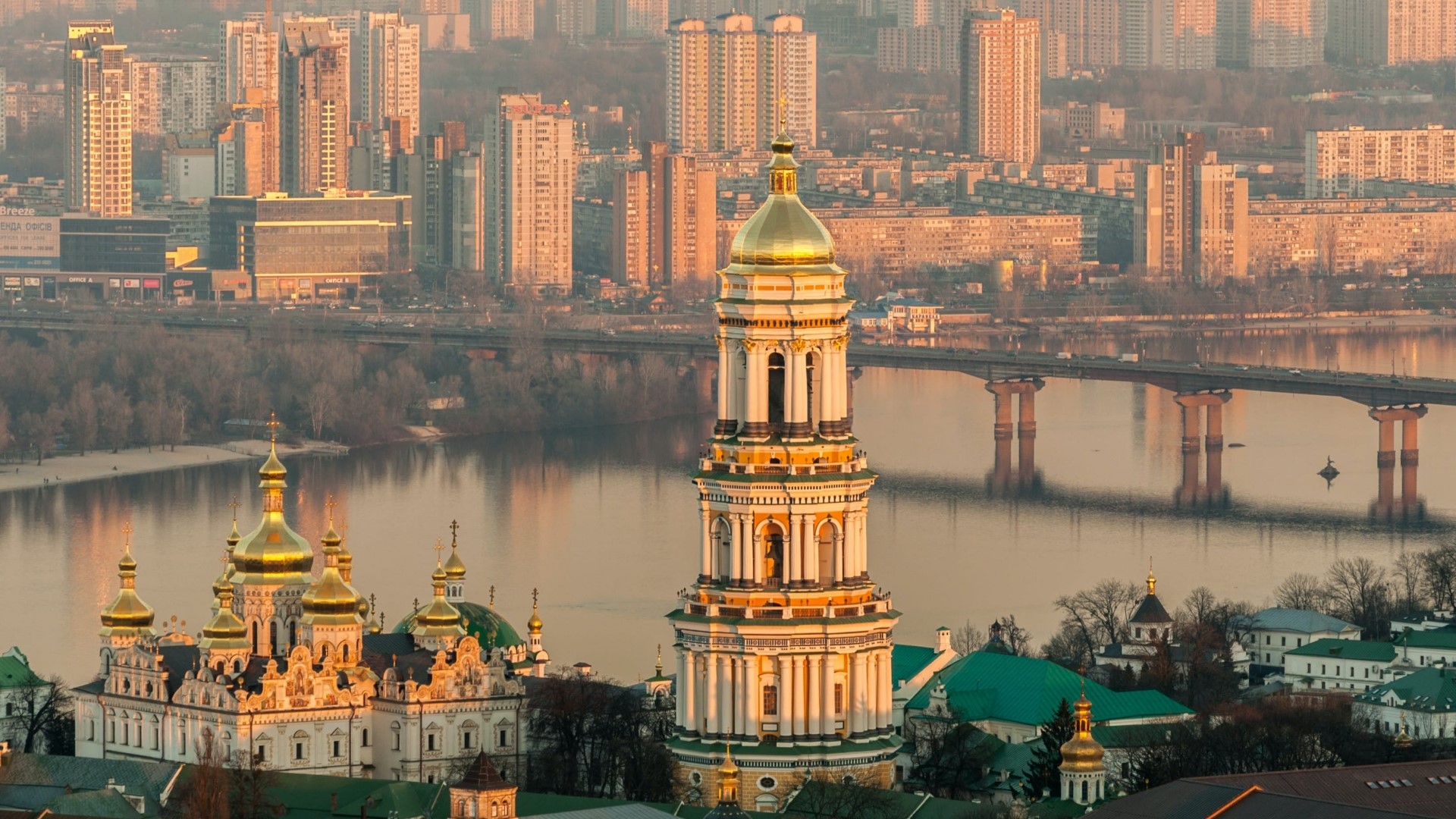 Kyiv cityscape with churches and bridge over river HD Wallpaper