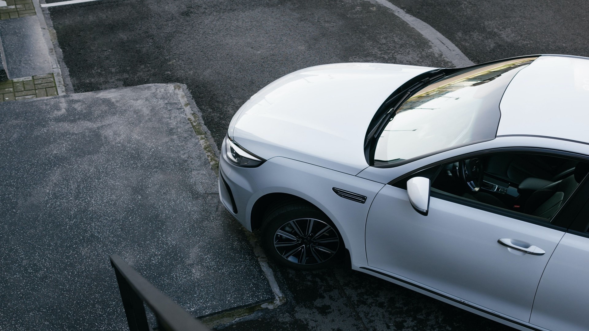 White sports car parked on asphalt HD Wallpaper