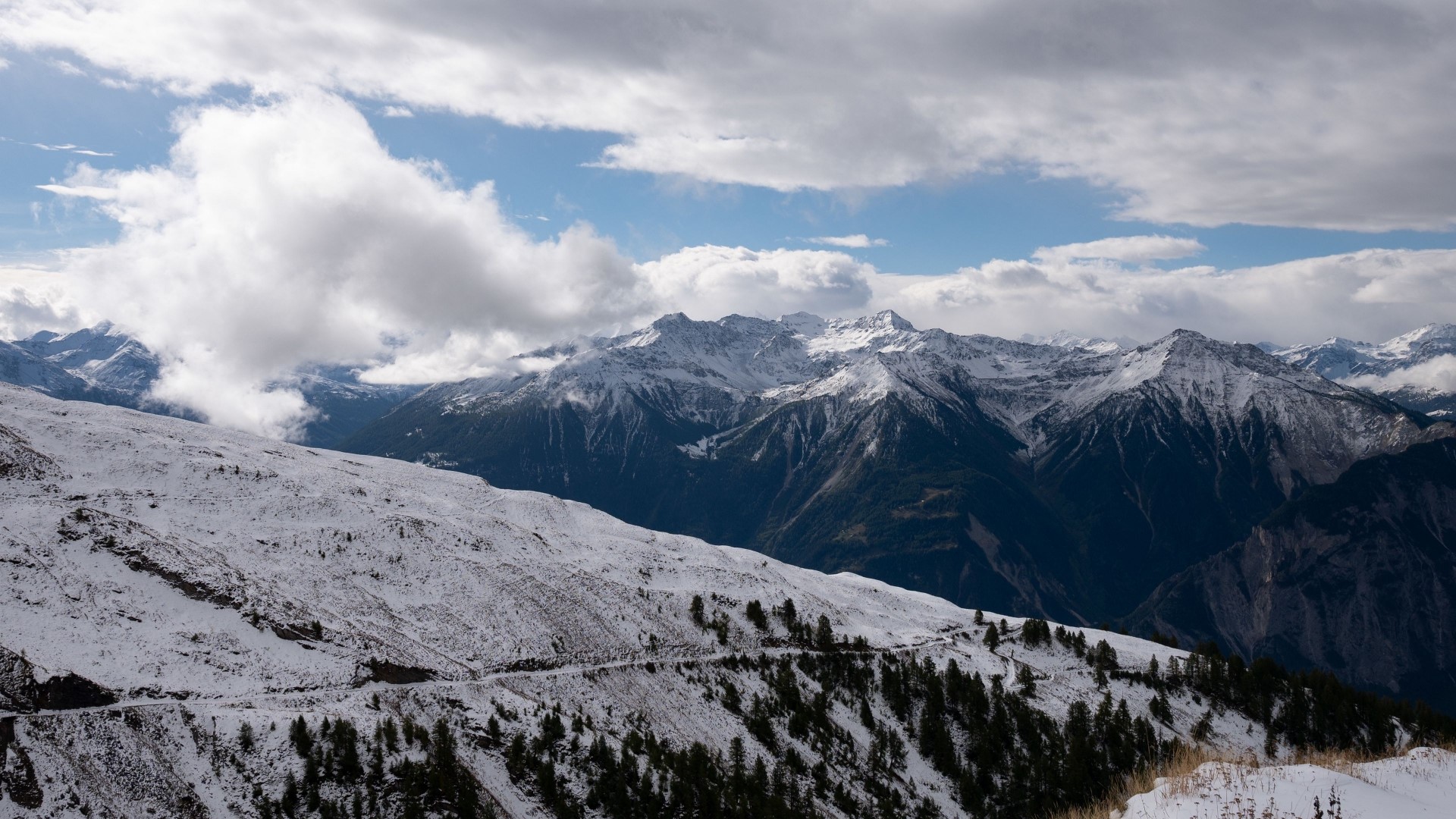 Snow-covered mountains and clouds HD Wallpaper
