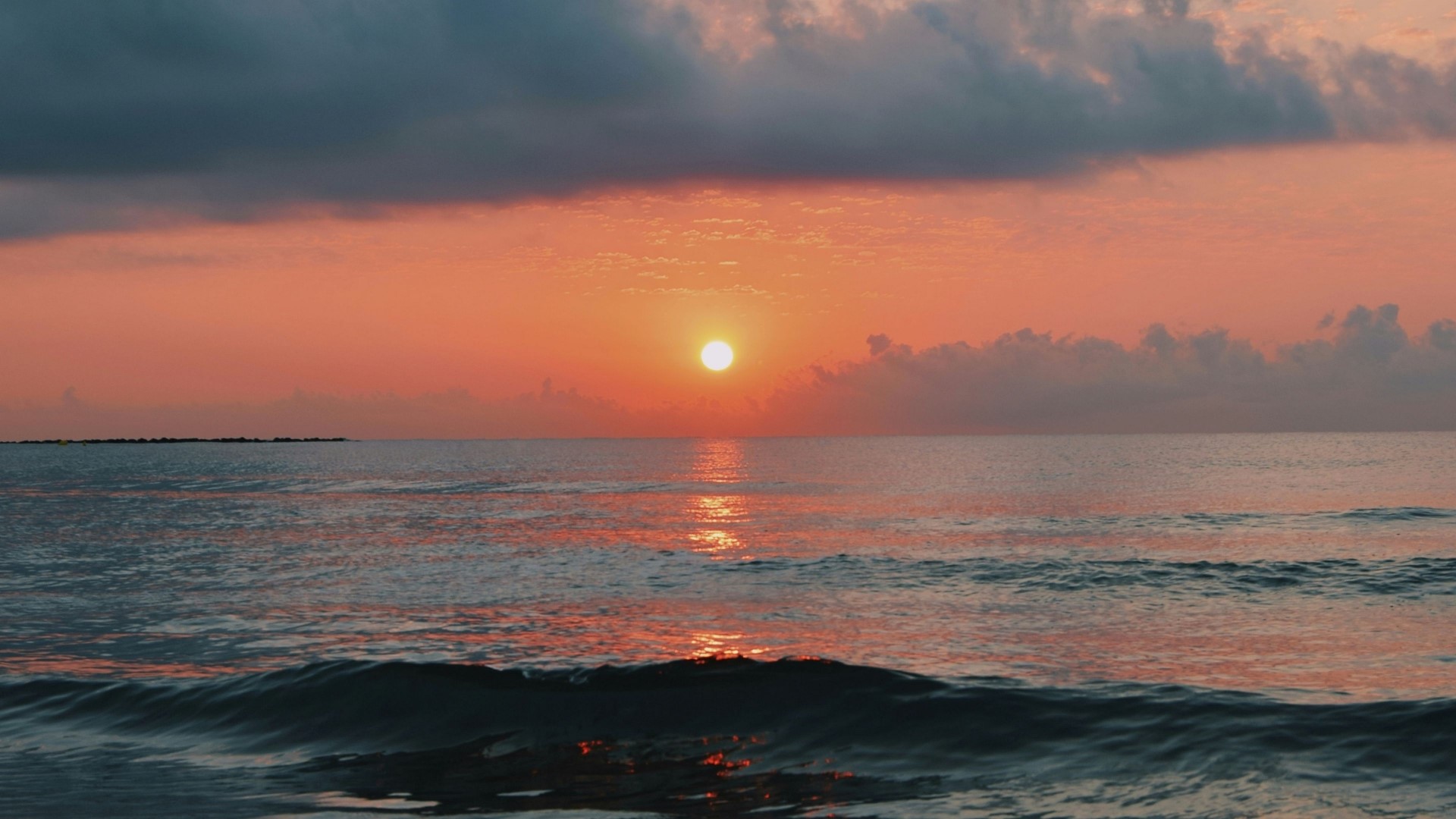 Sunrise over the ocean with clouds HD Wallpaper