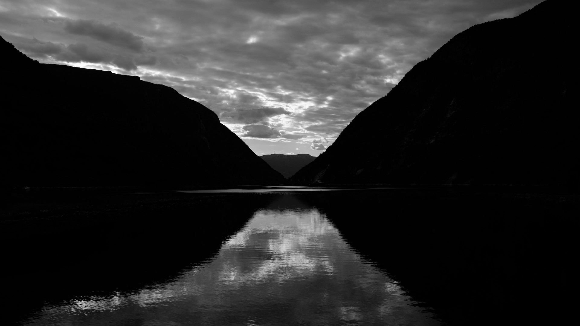 Lake between mountains with cloudy sky reflection HD Wallpaper