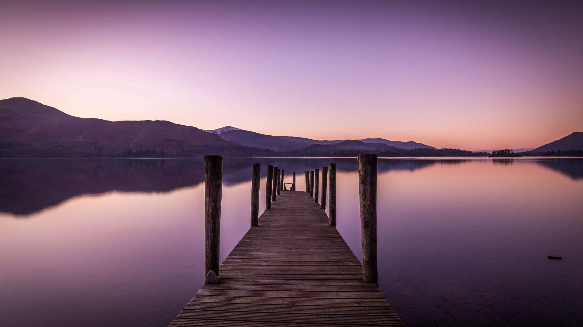 Wooden pier on a lake at sunset HD Wallpaper