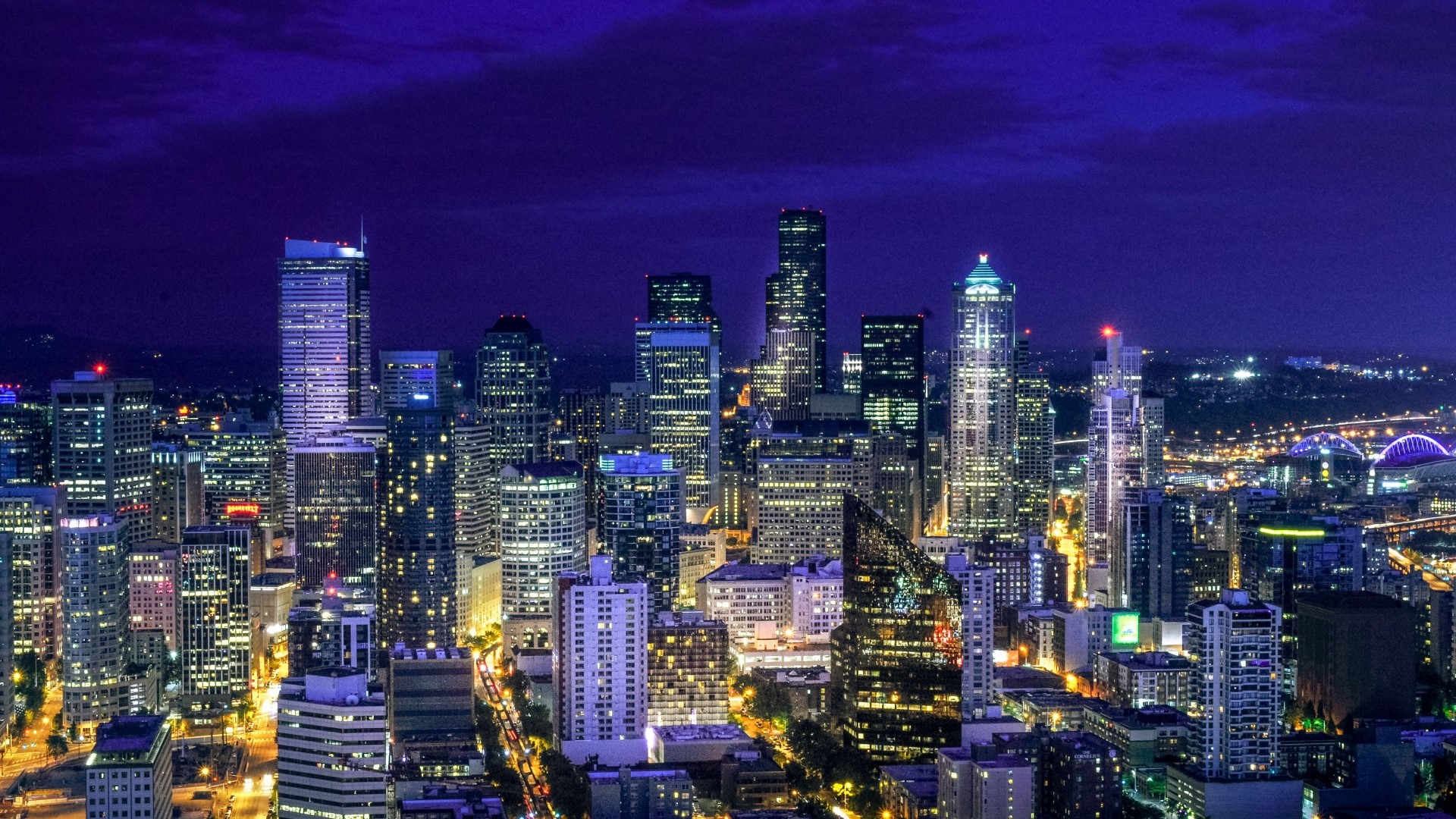 Night cityscape with illuminated skyscrapers HD Wallpaper